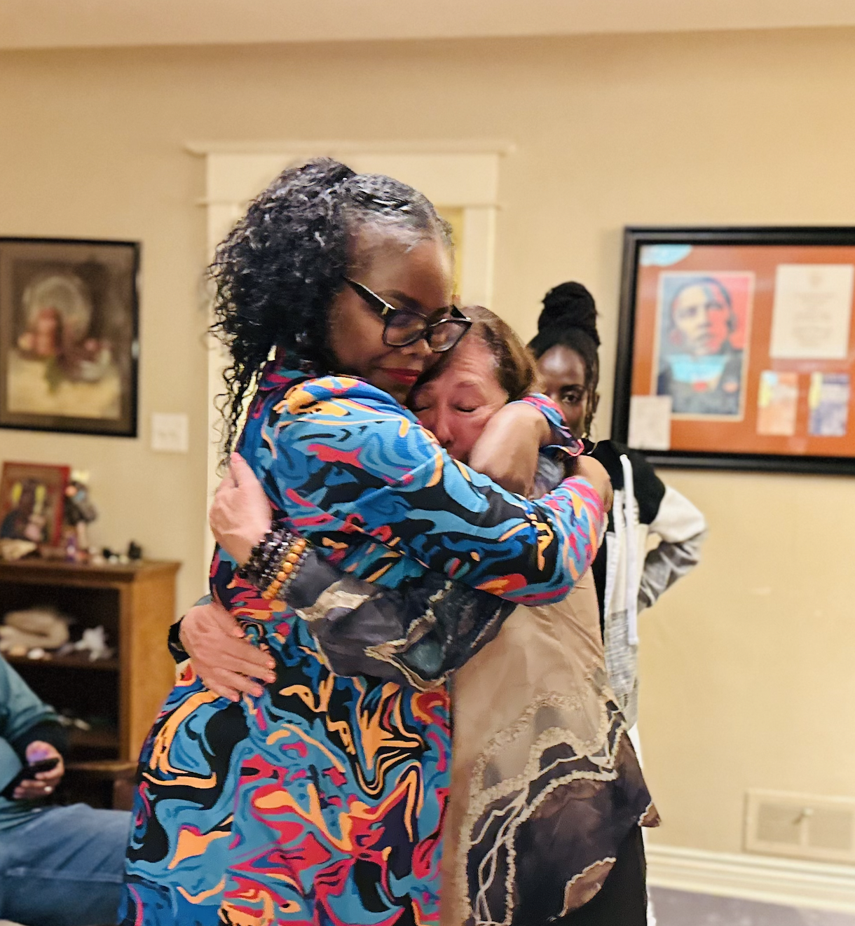 Shontel Lewis embracing a woman