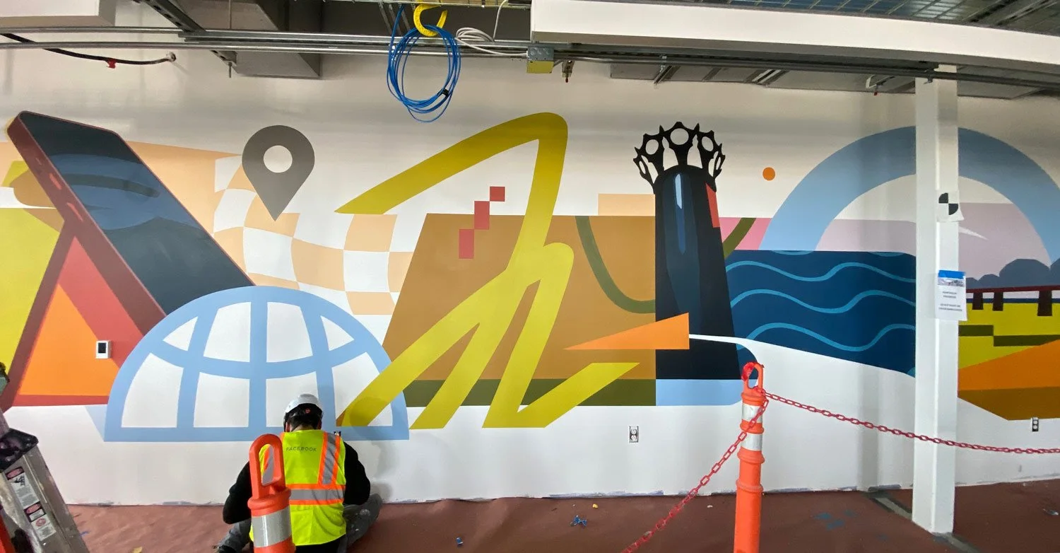 In progress view of a Interior data center office mural in Jeffersonville, Indiana that depicts the cross between tech and local landmarks