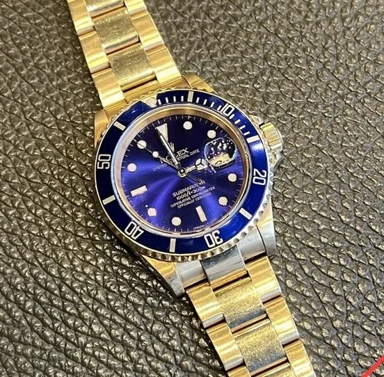 1991 Rolex Submariner  (ref. 16618) 18k YG Bluesy/Purple Dial