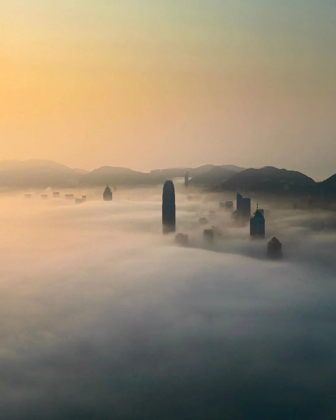 Silhouettes of the Central Business District in Hong Kong at sunrise