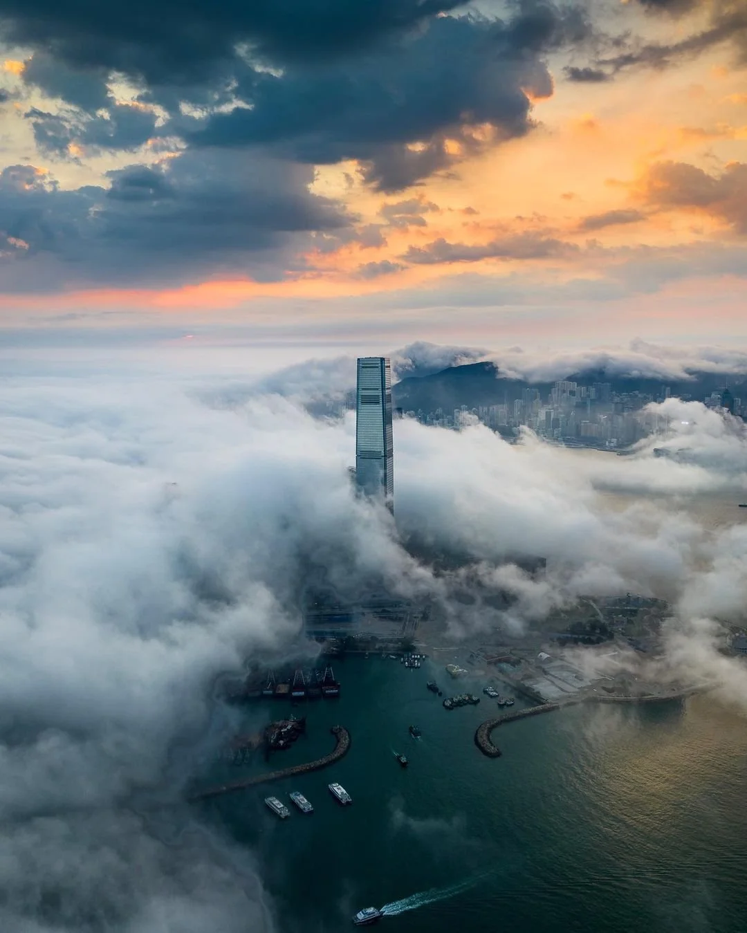 Aerial Image of the ICC at sunrise, surrounded by clouds