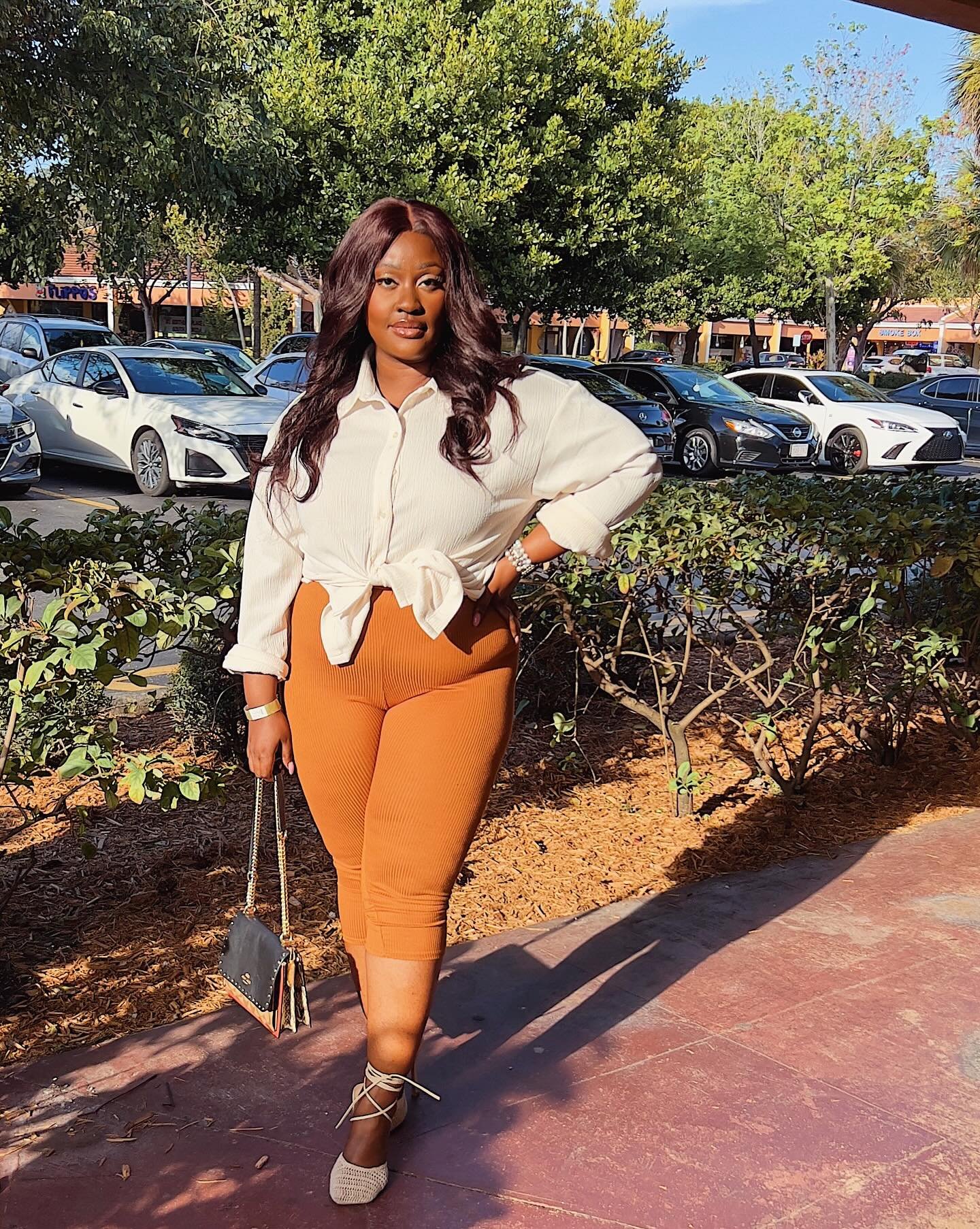 I&rsquo;m just a girl 💅🏾💋💕🥰 

📸 @irmeldaaaa 🫶🏾

Top: @charlotterusse 
Capri: @fashionnovacurve 
Heels: @boohoo 
Purse: @coach