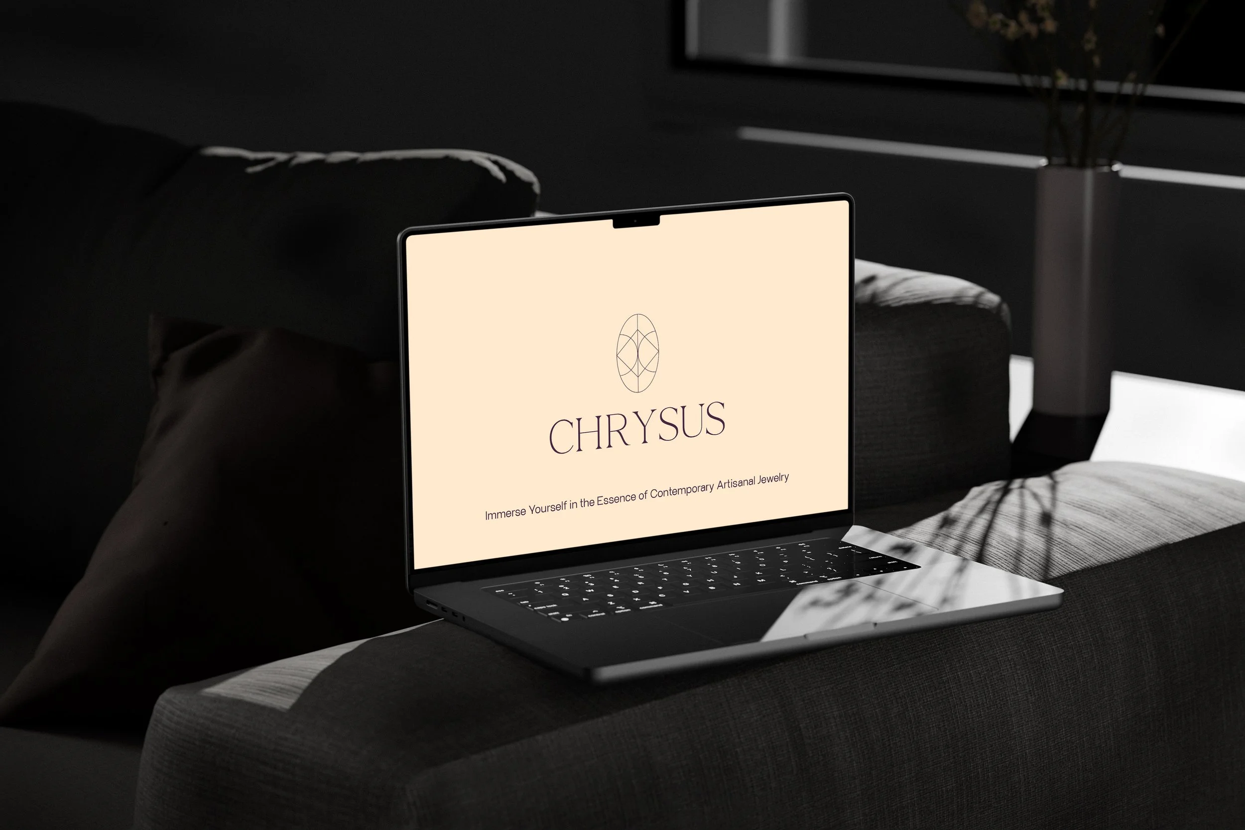 Free MacBook Pro on Settee Mockup.jpg