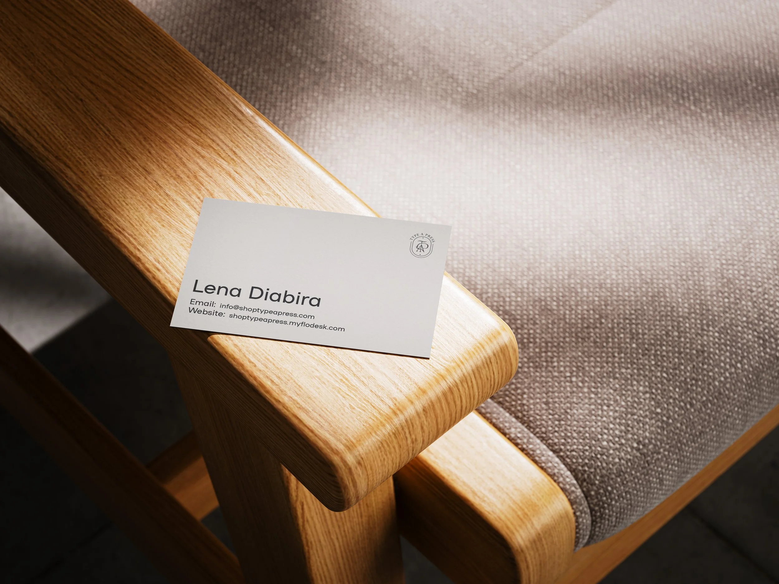 Business_Card_on_Armchair_Mockup_1.jpg