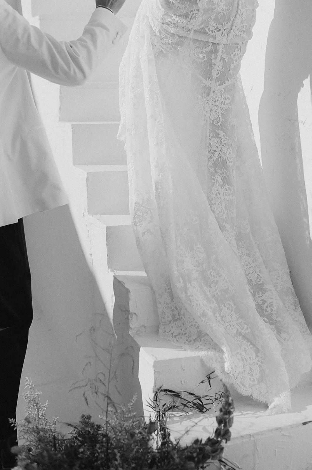 Lace wedding gown detail with light and shadow.