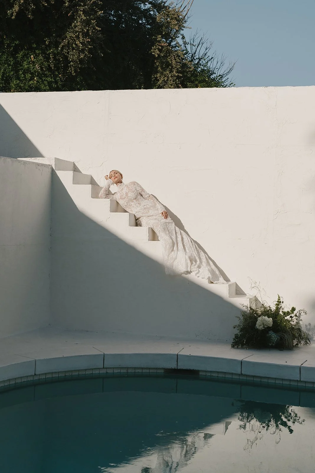 Portrait of bride with textured florals at Southern California wedding.