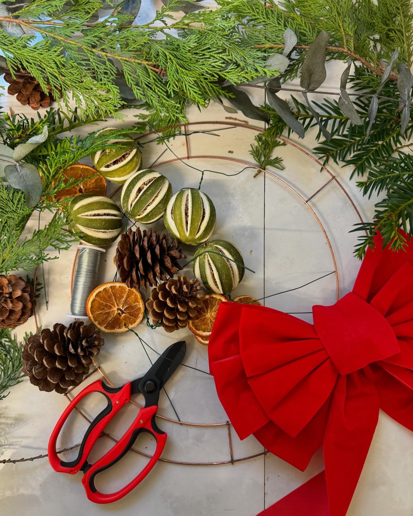 I&rsquo;ve had a few enquiries for DIY wreath kits , so I&rsquo;m putting something together. I&rsquo;m trying to photograph a &ldquo; how to&rdquo; . 
The kits will include lots of lovely foliage, all the tools needed, pinecones , dried citrus decor
