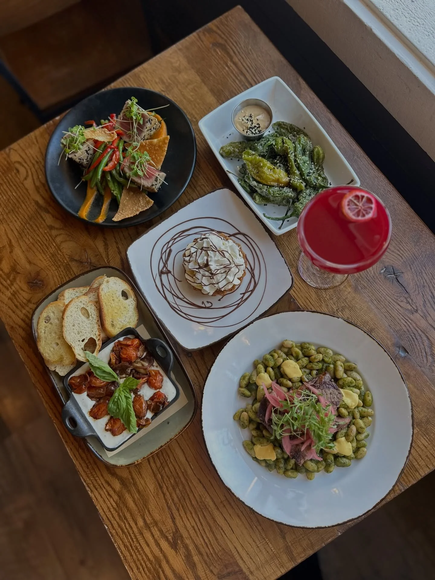 🍽️ @manorhilltavern | Restaurant Week Menu

🌶️ First Course Options
Blistered shishito peppers with peanut dipping sauce + sesame seeds
Tomato &amp; feta dip with balsamic roasted tomatoes and crostini

🥩 Second Course Options
Seared tuna with ses