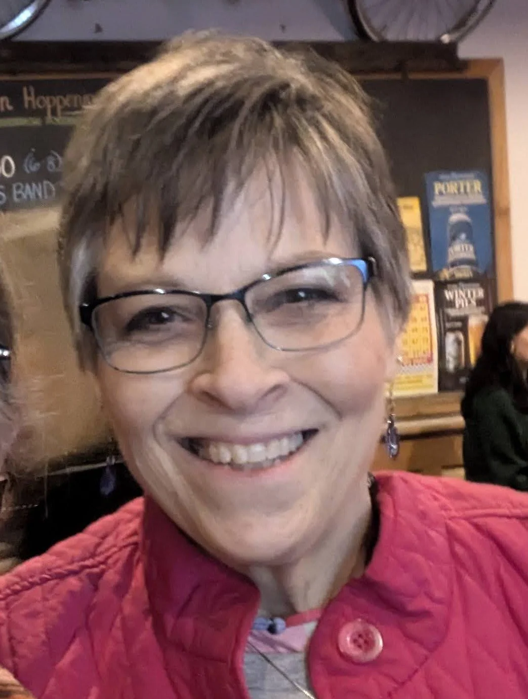 Silhouette of a tree and open book on green circle background