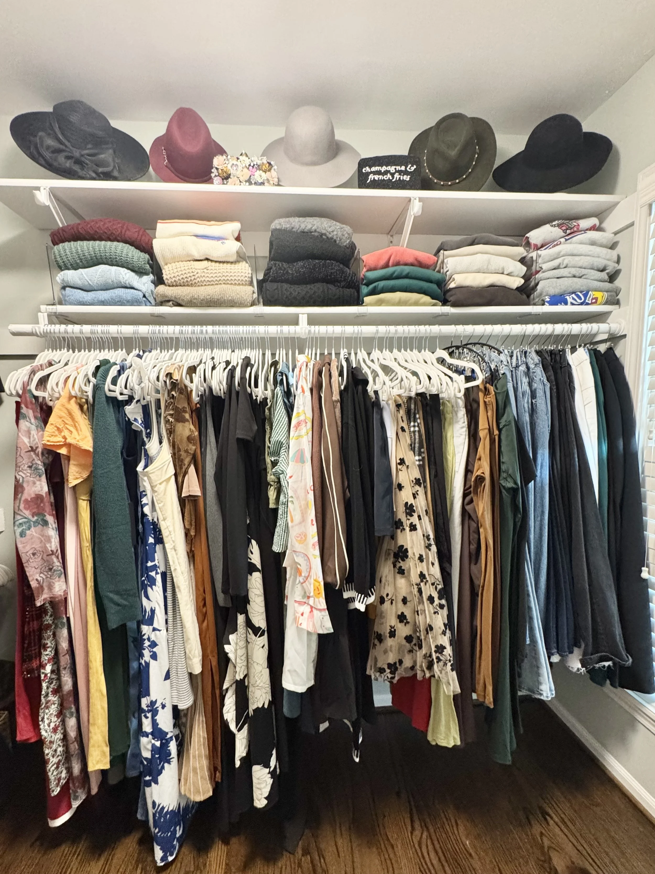 Organized primary closet in Leawood, Kansas by Everyday Organize