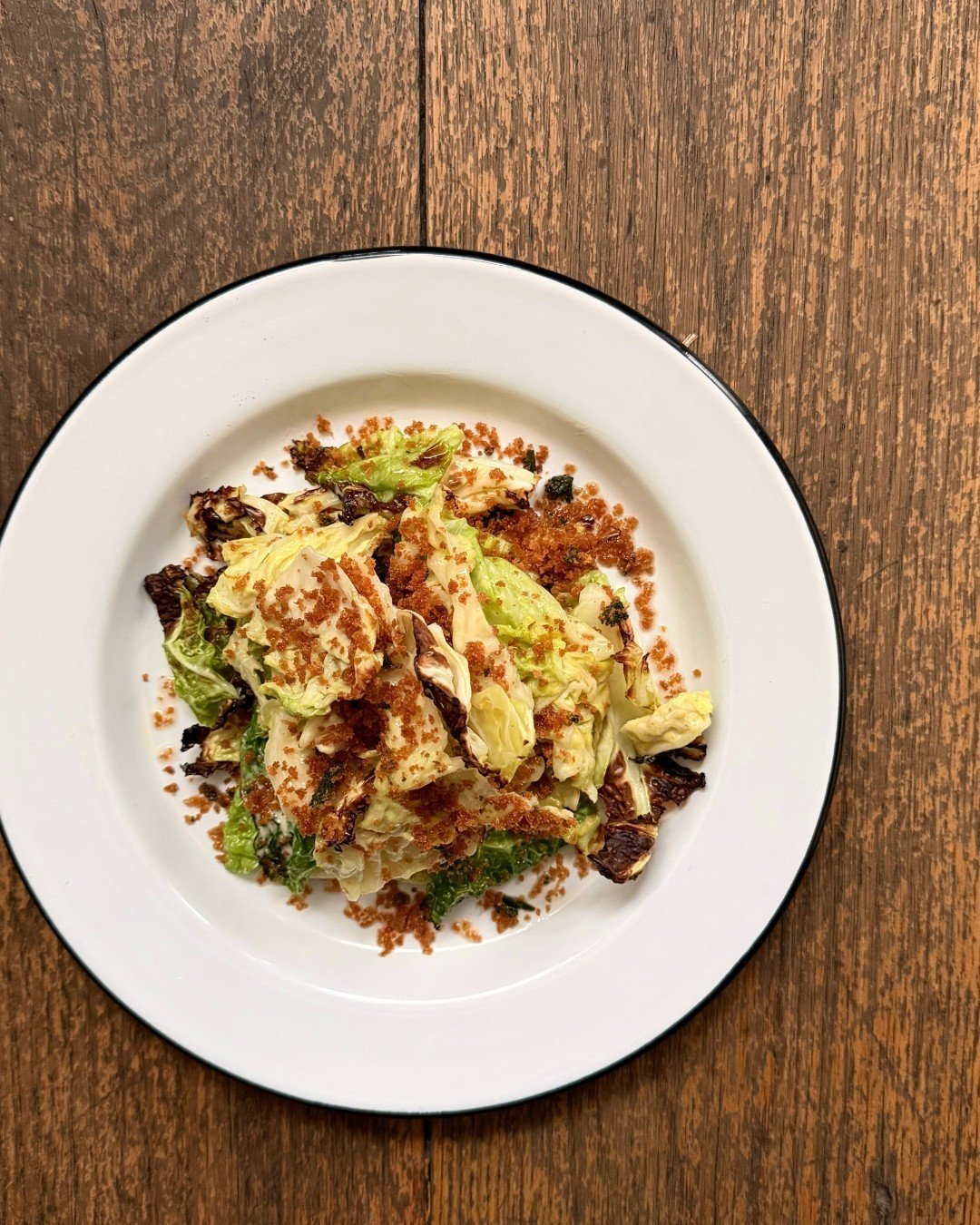 new + moody &mdash; our warm cabbage salad with roasted garlic dressing, sage breadcrumbs.