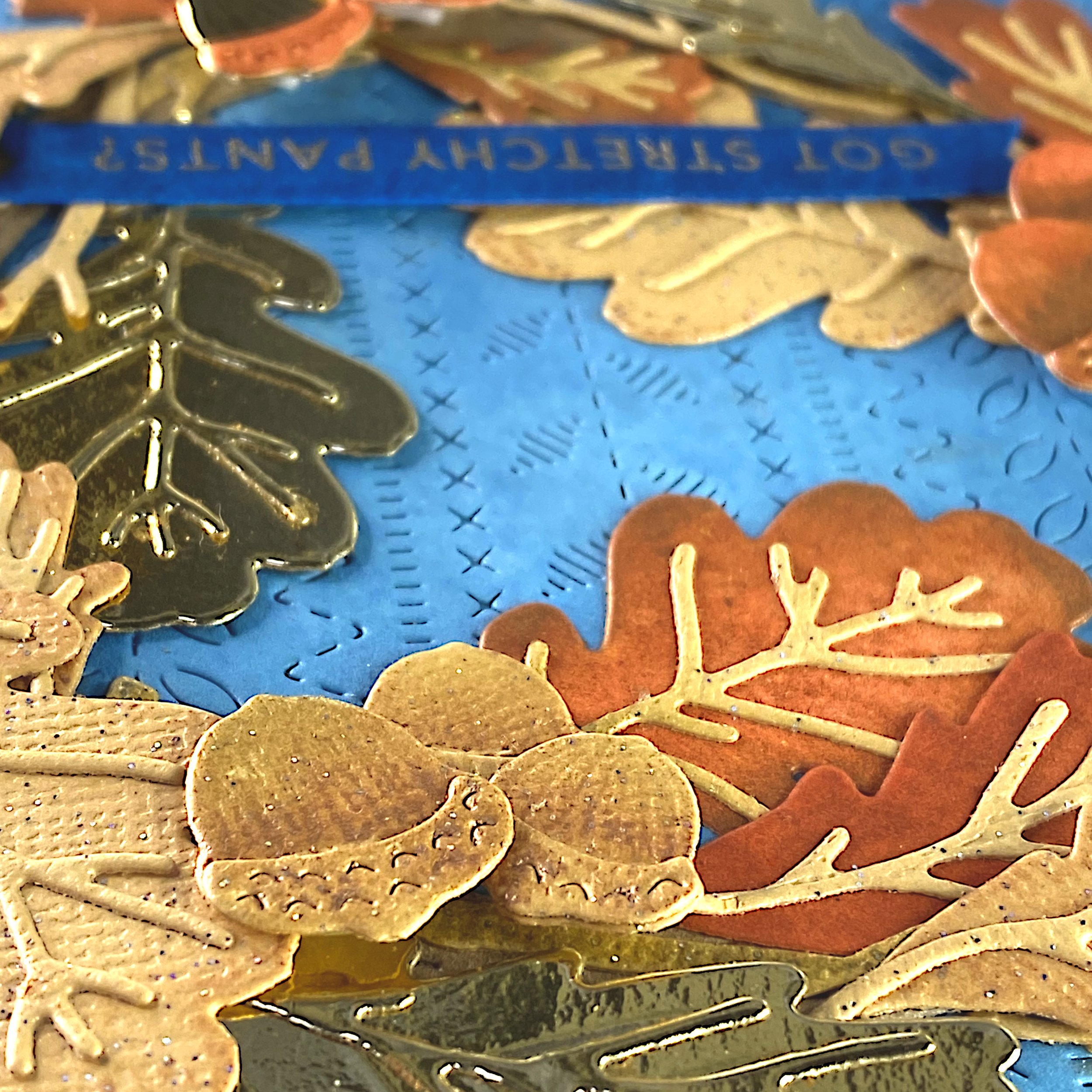 A greeting card with a wreath made out of oak leaves