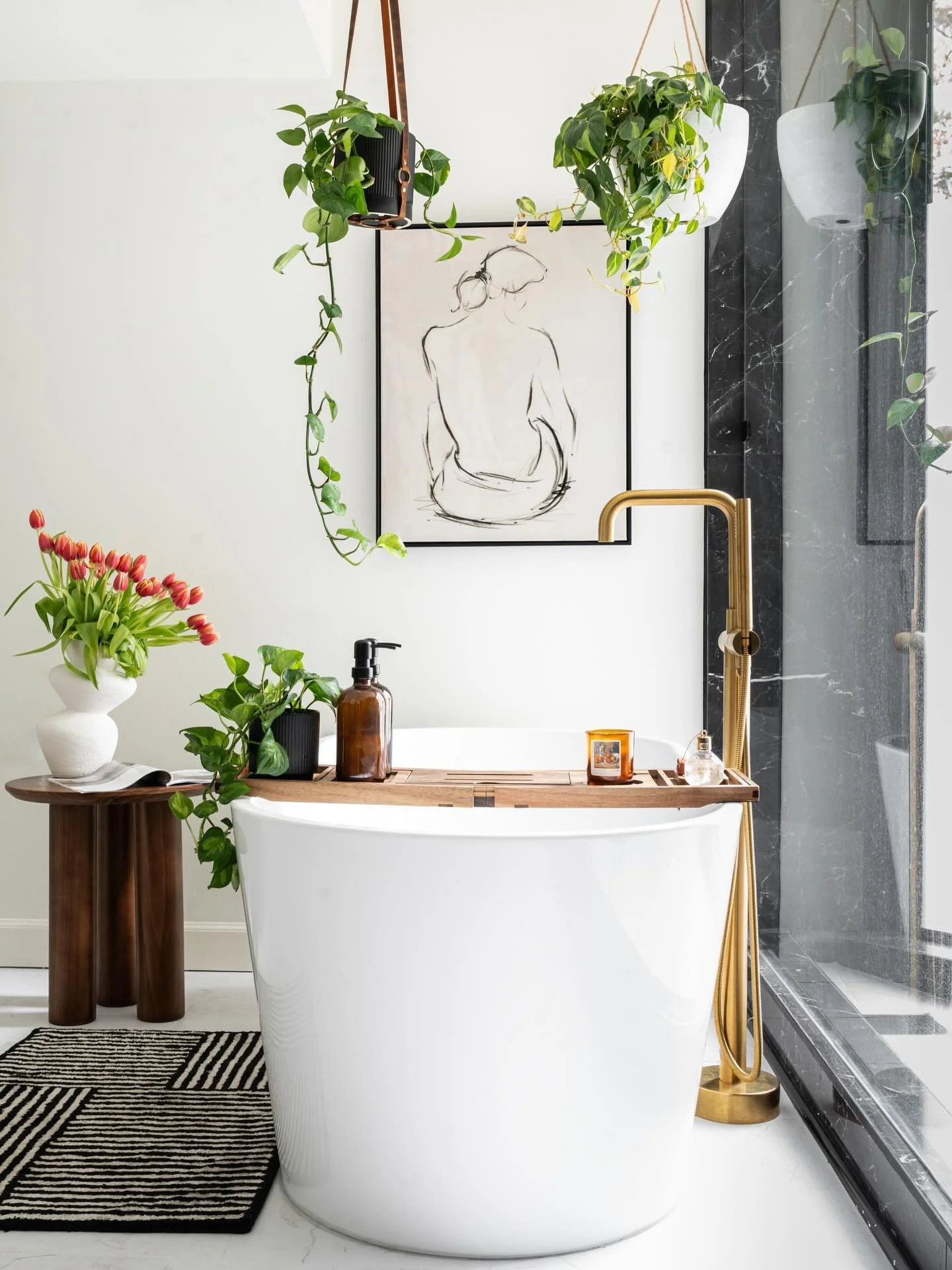 Swipe for this insane transformation &gt;&gt;&gt;!
This 1970&rsquo;s primary bath had a wall of dated glass blocks standing between it and its stunning forest view&hellip; so we removed it. 🥳🪟🌲

Cahill Design opened up the entire space, brought in