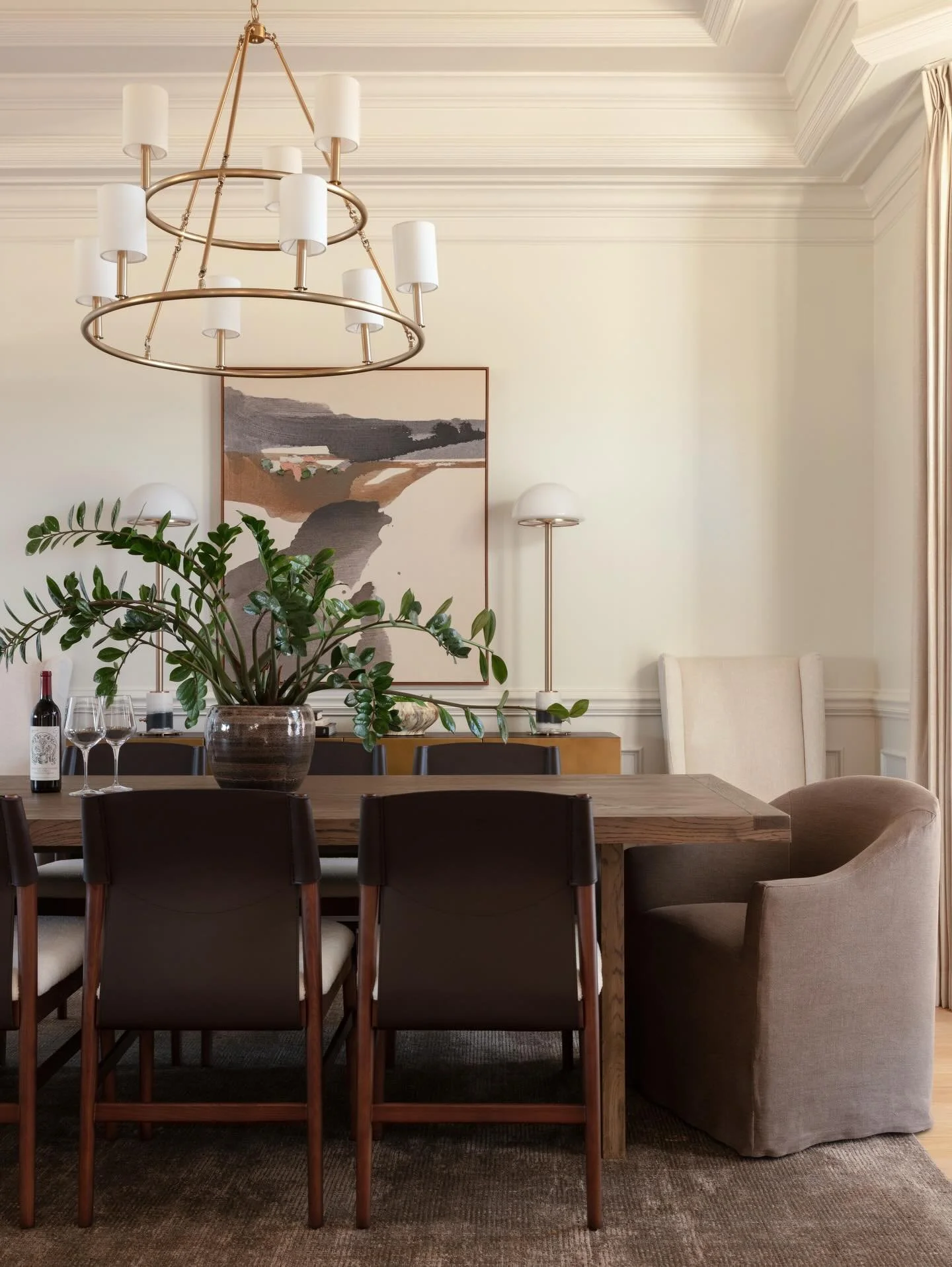 This room had some of the most intricate trim work we&rsquo;ve ever seen &mdash; stunning, dramatic, and honestly&hellip; overwhelming (scroll to the before).

Instead of removing it or competing with it, we edited everything around it. A softer pale