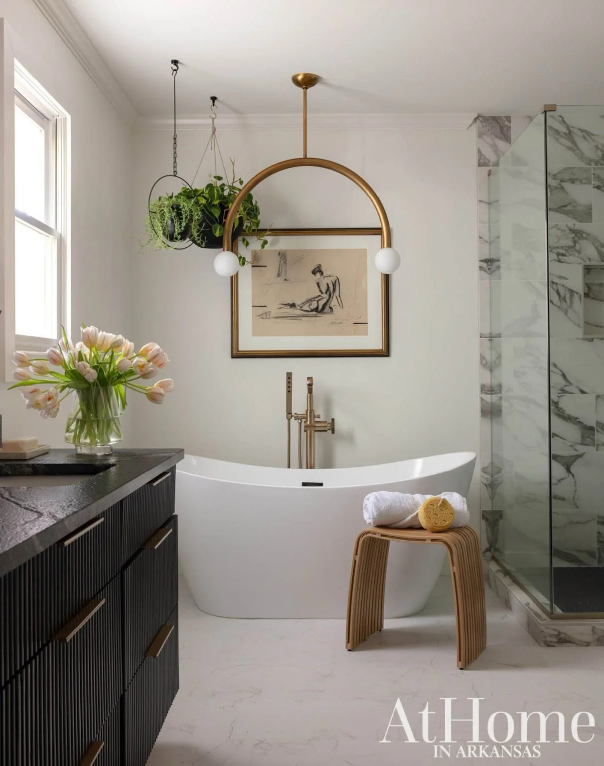 Designing spaces like this will never get old, where modern meets funky and every detail matters🤍

From the statement lighting to the rich textures, this bathroom is one of my favorites to date.
So honored to have it featured in At Home in Arkansas 