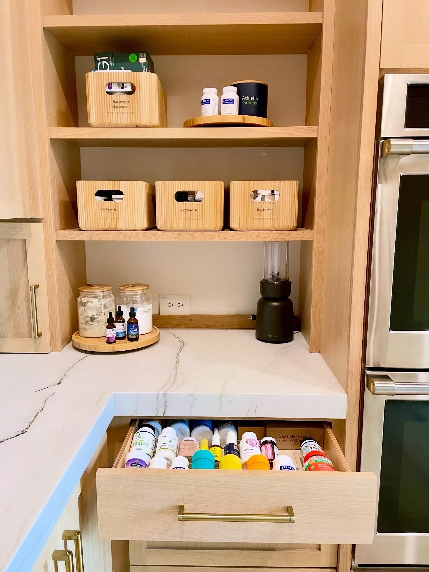 The ultimate supplement zone setup 🤩 

Incudes: 
&bull; Angled drawer inserts so you can easily see labels 
&bull; A hidden cabinet for Nutribullet accessories 
&bull; Bamboo bins for jars and bottles 
&bull; Lower drawers for larger containers + ba