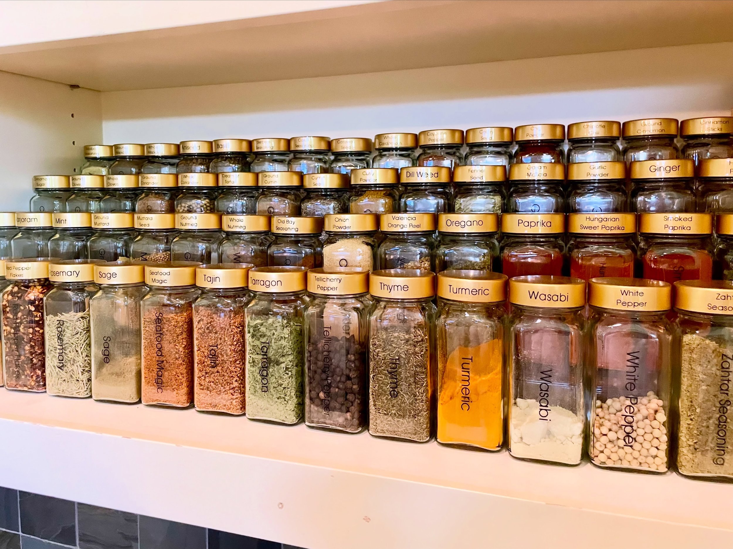 Small details make all the difference! 

Normally, when you place spice jars on tiered risers like this, you can&rsquo;t see the labels on the front of the jar so you have to pick up each bottle until you find the spice you&rsquo;re looking for&helli