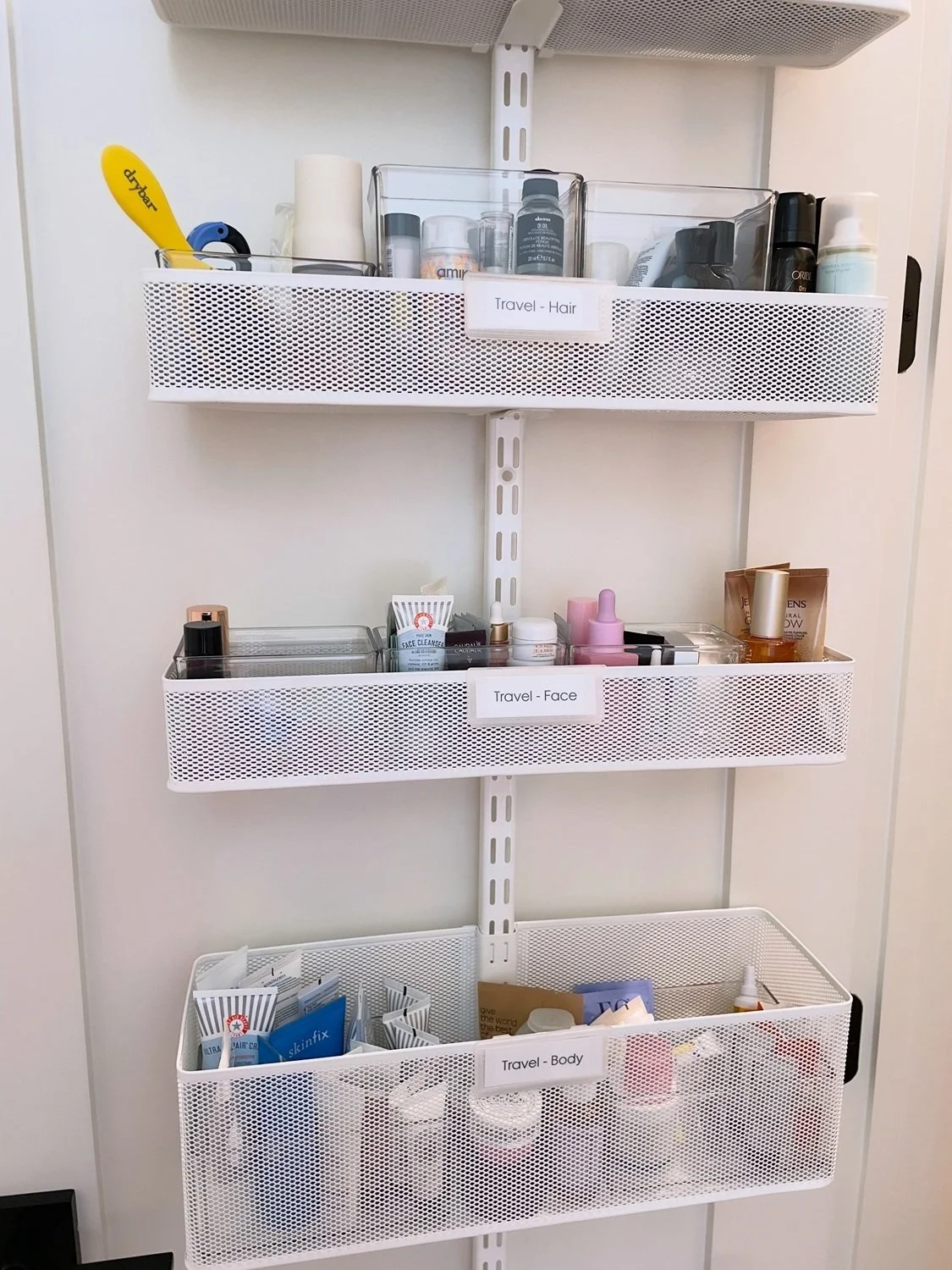 Travel Items in Over the Door Baskets.jpg