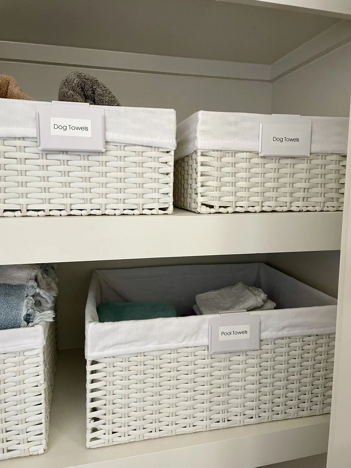 Linen Closet with White Baskets.jpg