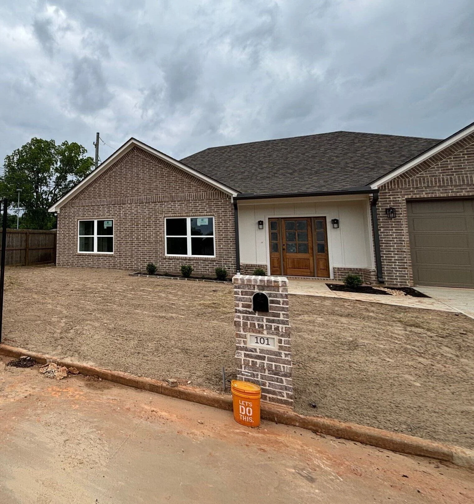 The Champion Exterior paint masonry landscaping and final grade new construction hallsville tx.jpg