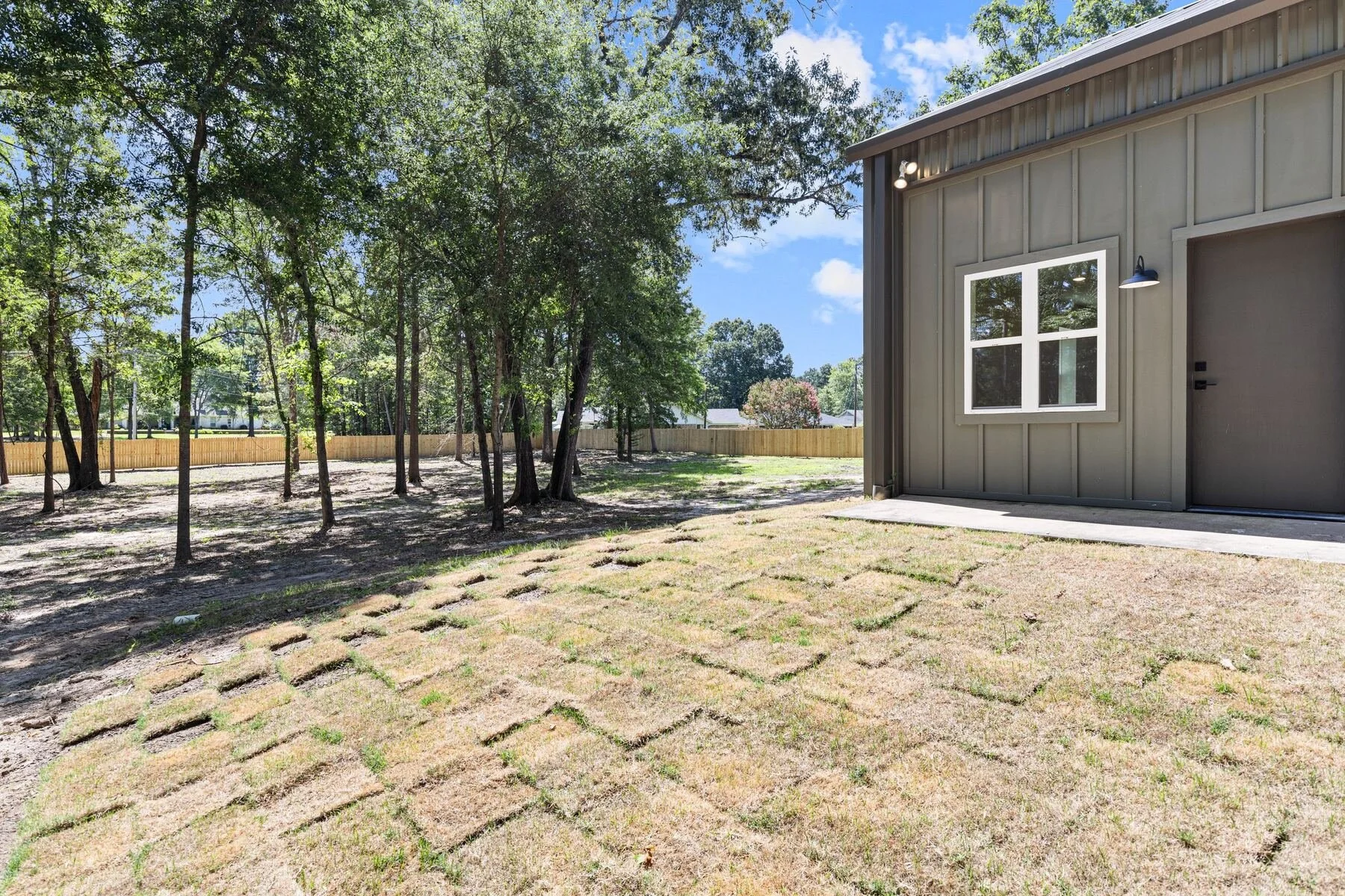 The Shouse Exterior Sod and yard residential builder Hallsville Tx.jpg