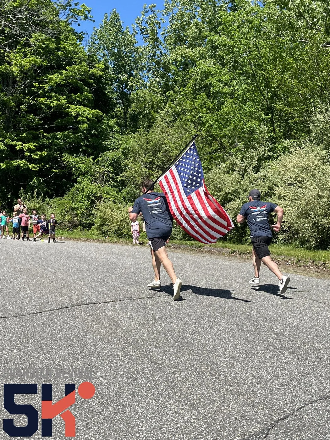 GR 5K 2026-05 high fives flag.jpeg