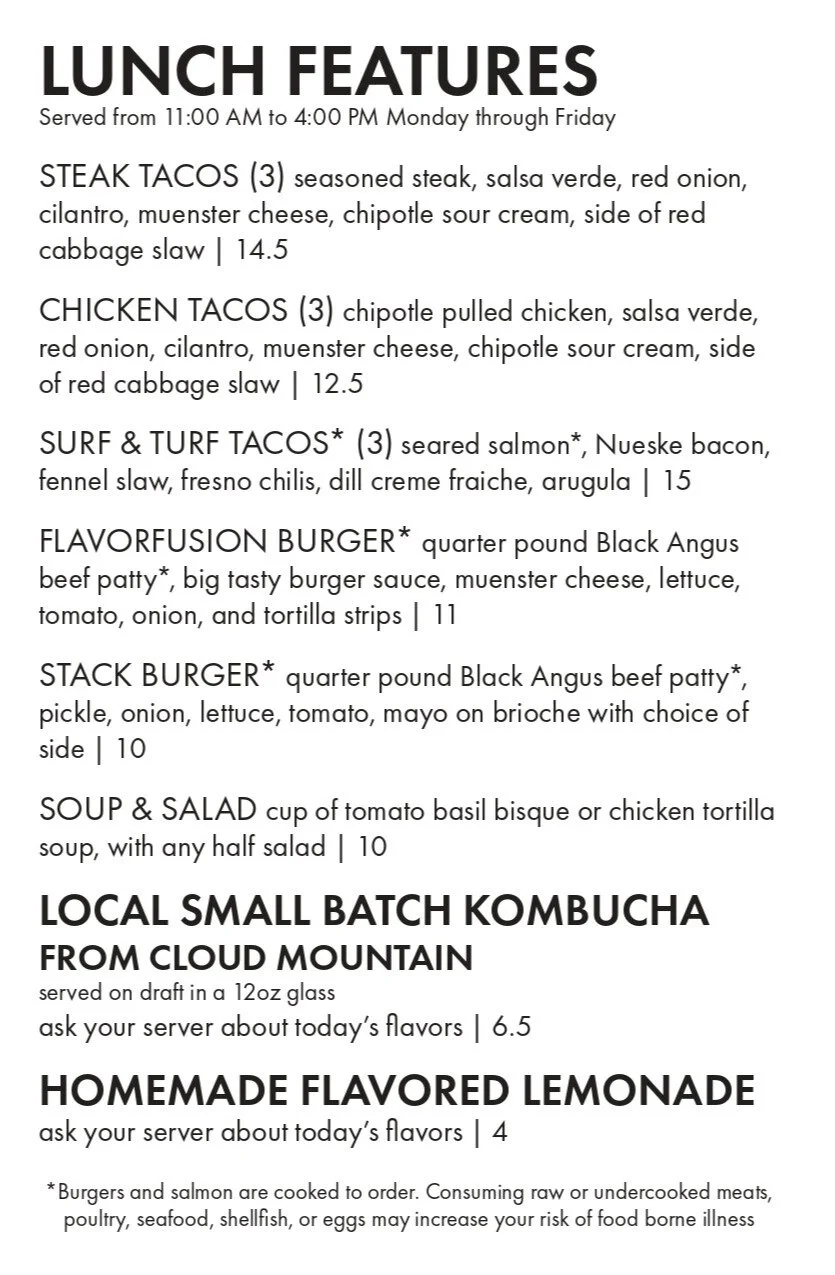 Lunch menu featuring steak tacos, chicken tacos, surf and turf tacos, a flavorful burger, a stack burger, soup and salad, each with descriptions and prices, plus options for a small batch kombucha and homemade flavored lemonade.