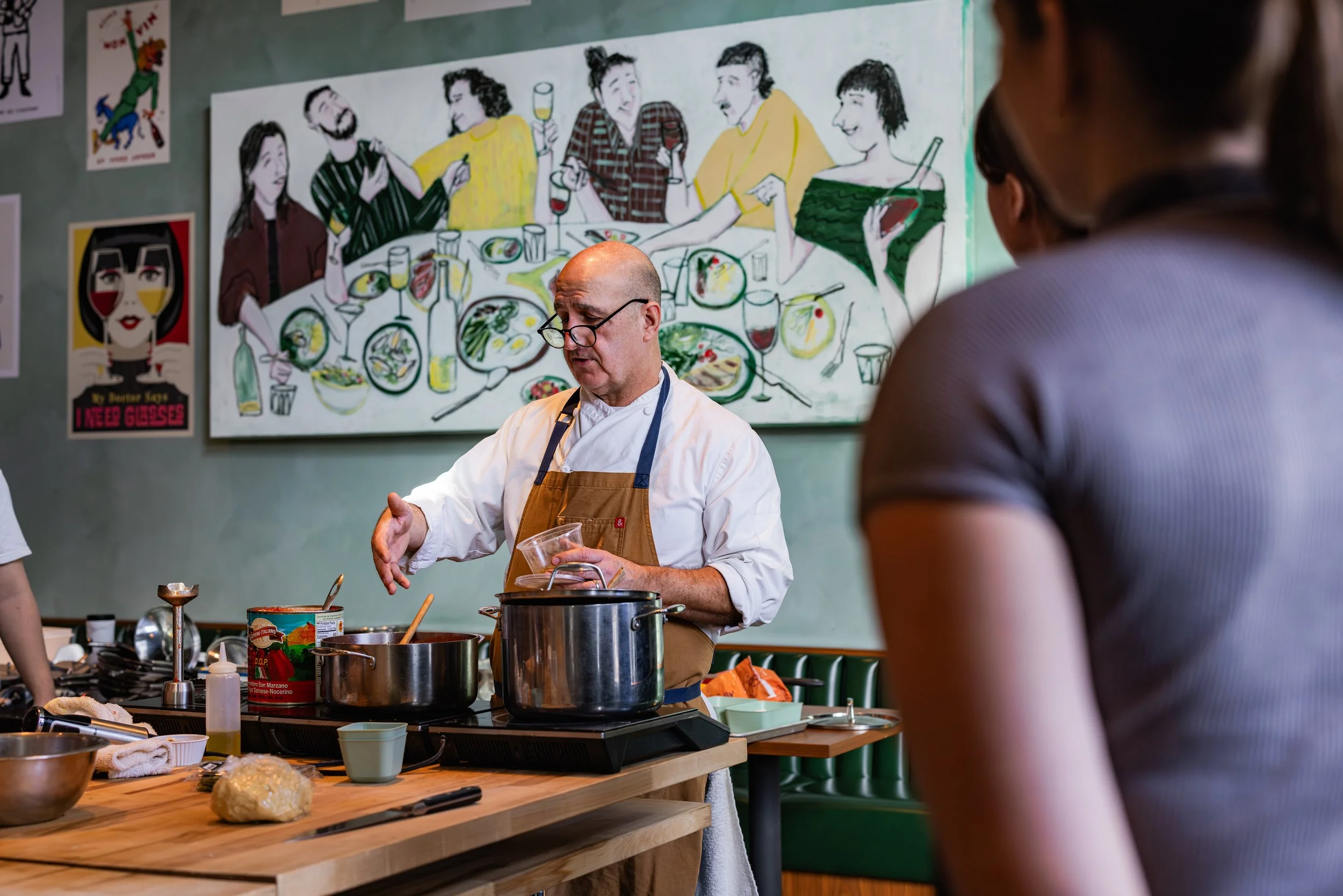 Teacher leading cooking instruction