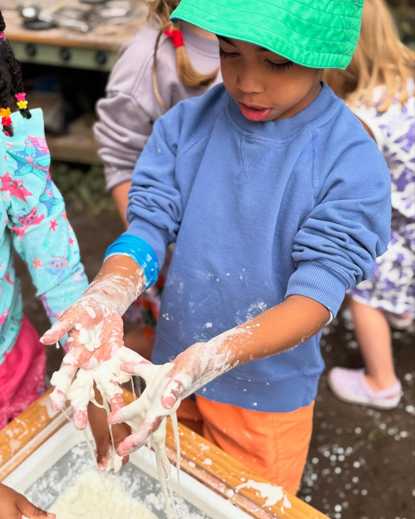 I WONDER&hellip; two words that spark every adventure.

Too chilly for pools and sprinklers, so we set up outside and mixed oobleck&mdash;cornstarch + water&mdash;while the water table ran nearby. The kids tested, tweaked, and asked, &ldquo;How much 