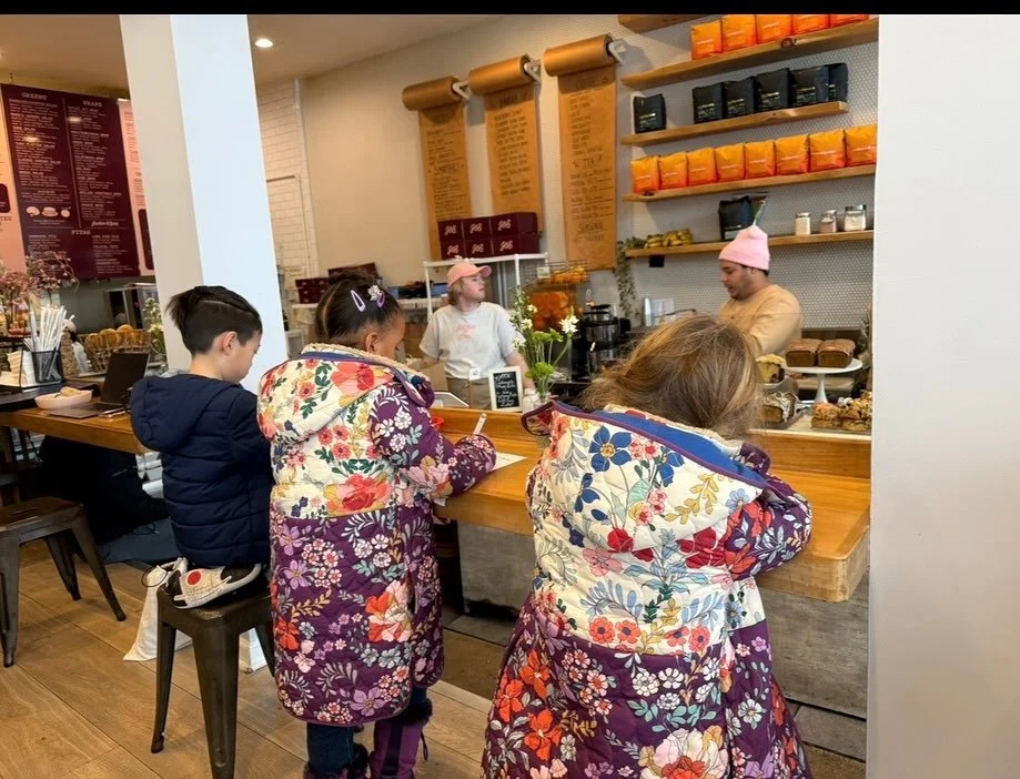 At Weekday School, we delve deep. When the K-1 class opened a pretend restaurant during play time, teachers followed their enthusiasm. What happened next was a masterclass in cross-curricular learning. The class read books about restaurants, composed