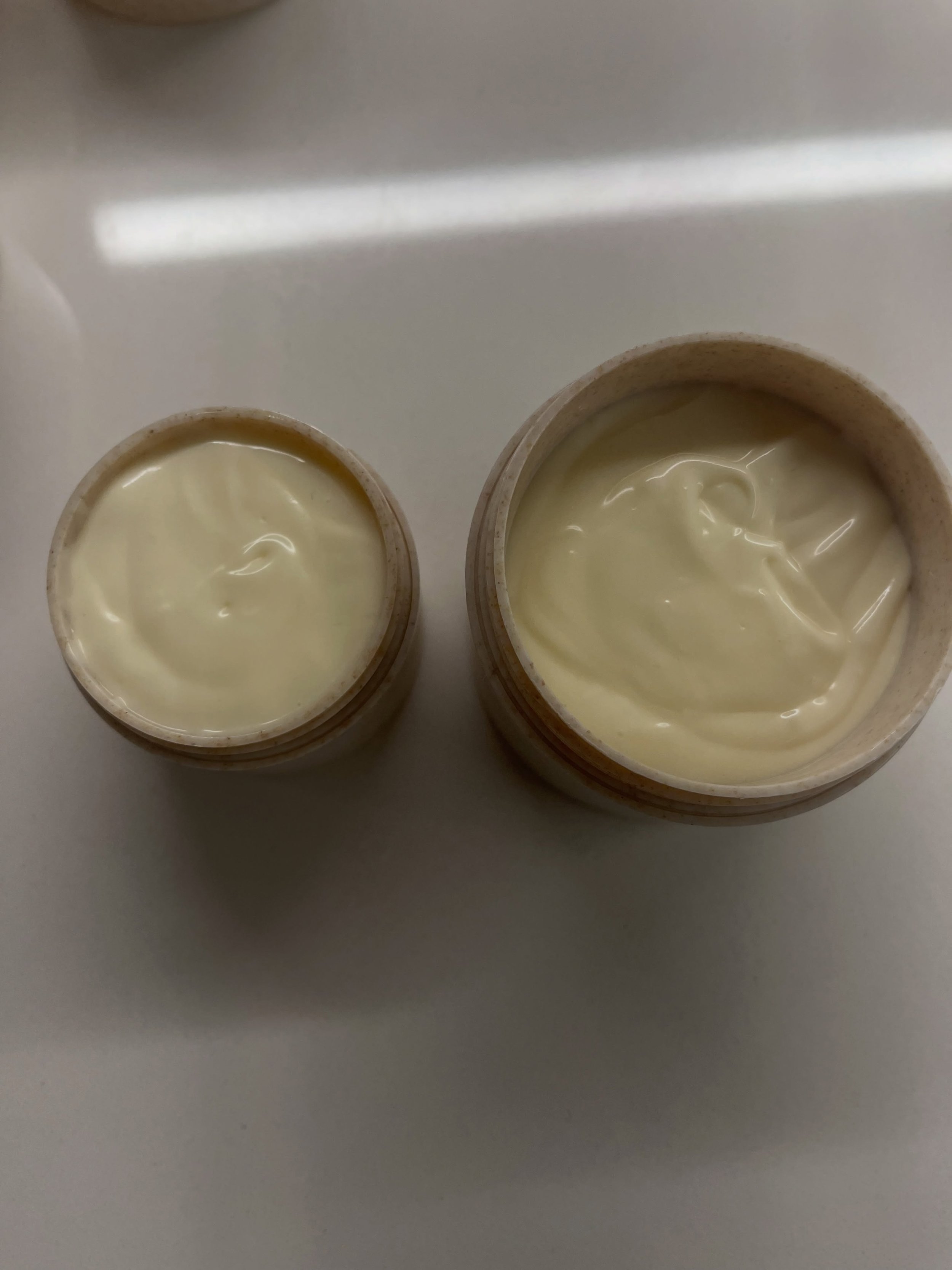 The side by side 😅 whipping up back to back batches and realizing something&hellip; these little containers are harder to fill in comparison and I literally cringe each time I put the liner on&hellip; 🫪 My poor body butters getting a little squashe