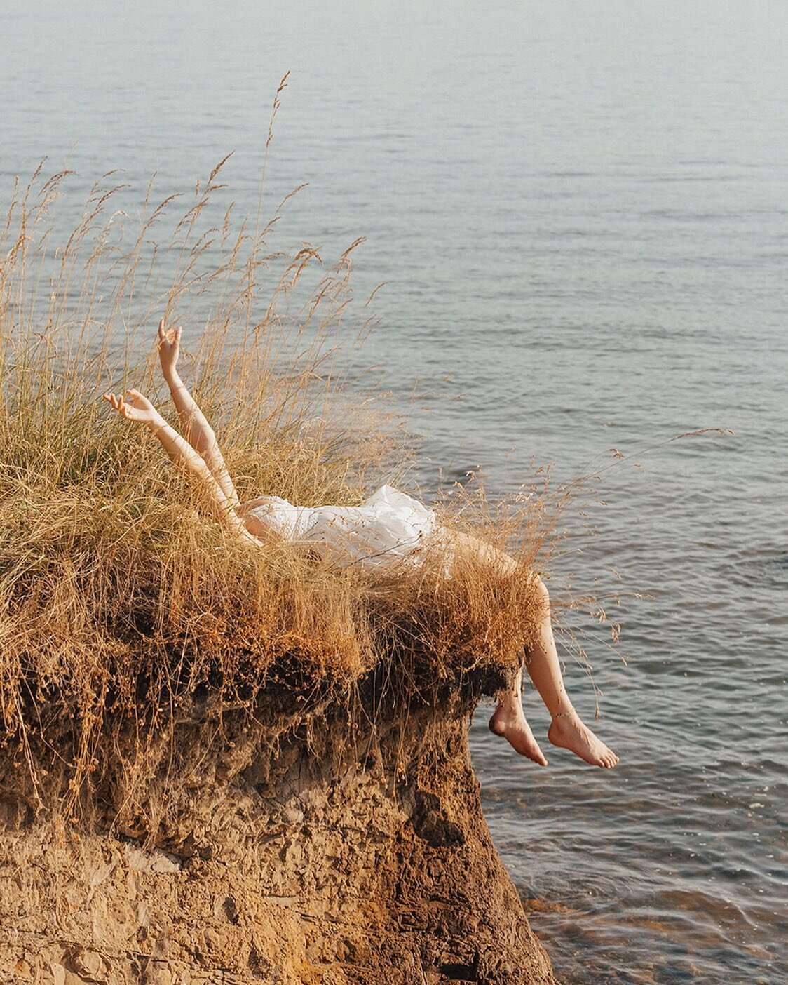 Laying in the fields up in the San Juan Islands this week #seattleseniorphotos #orcasisland