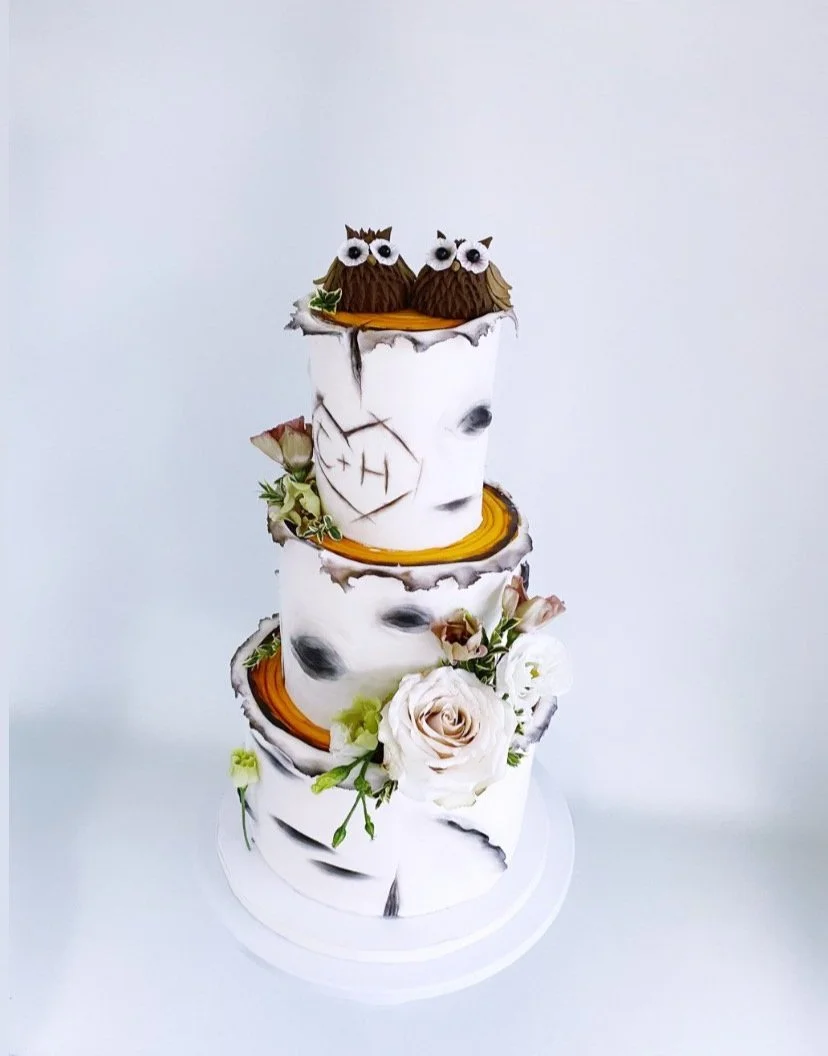 Buttercream birch design with fresh flowers
