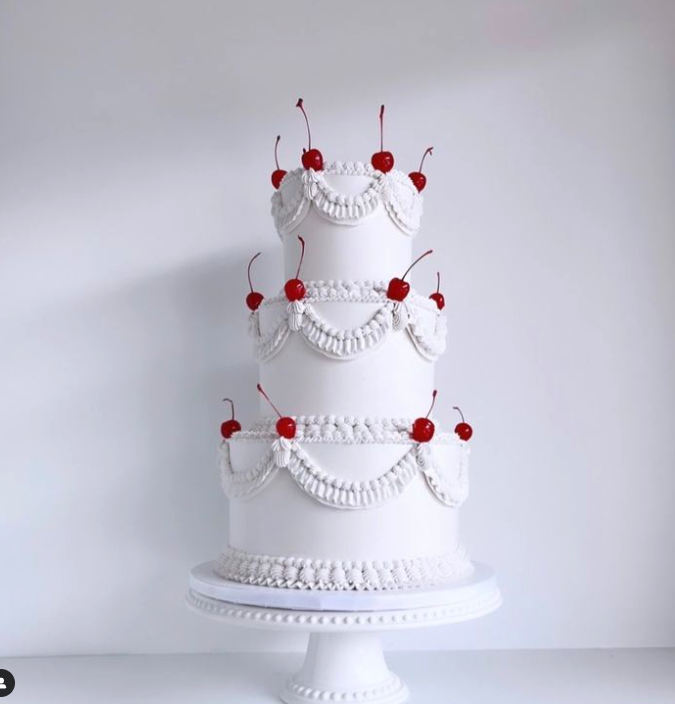 Vintaged buttercream piped design with cherries