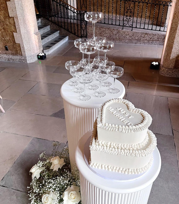 Vintage heart-shaped piped buttercream design with fondant letters