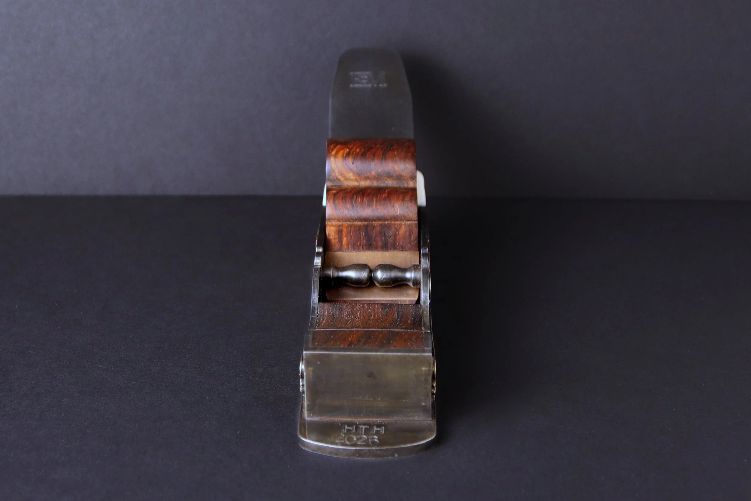 Folk art miter plane with brass and copper turkey applications