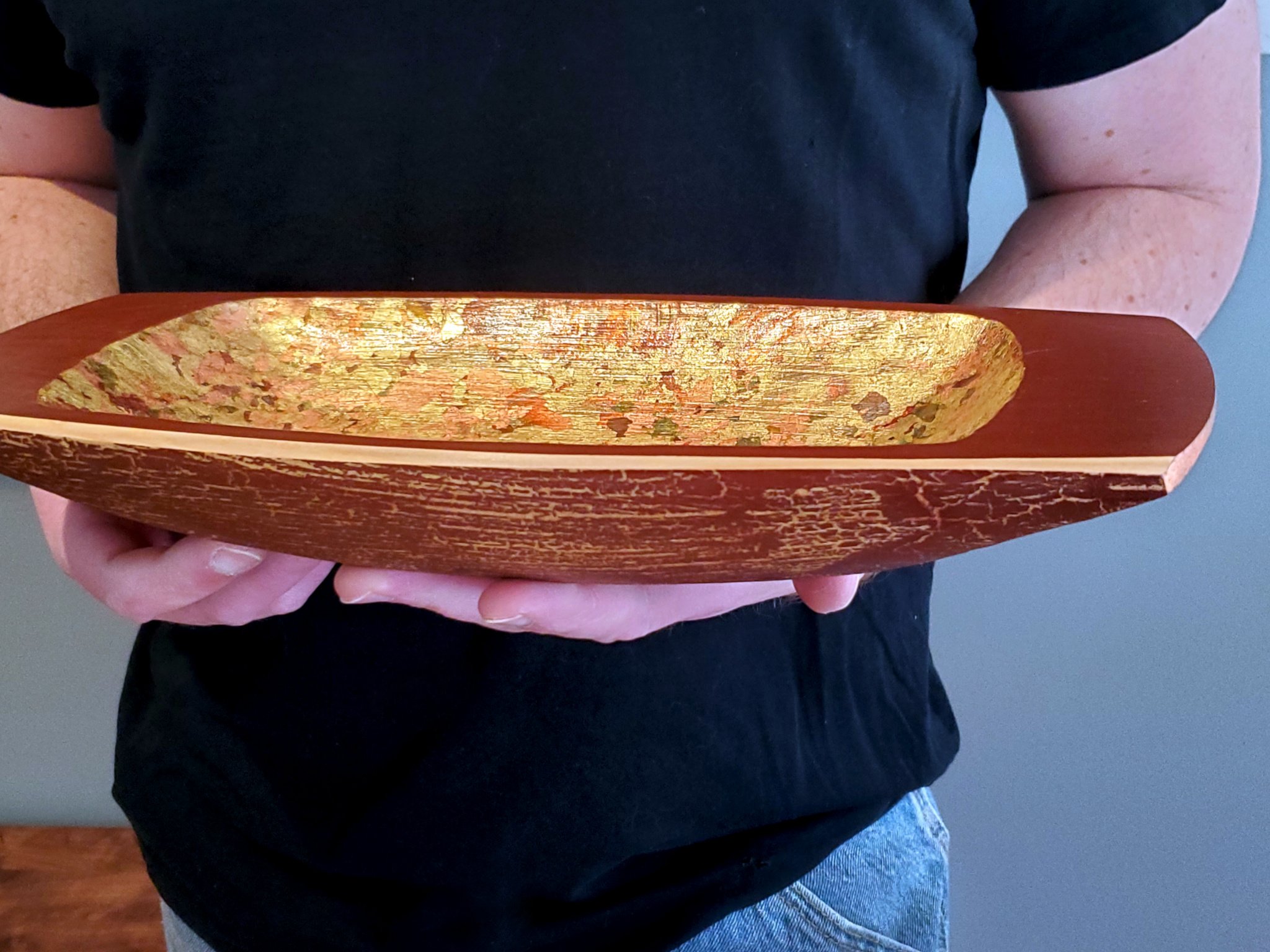 Carved cypress bowl with metal flake and barn red milk paint