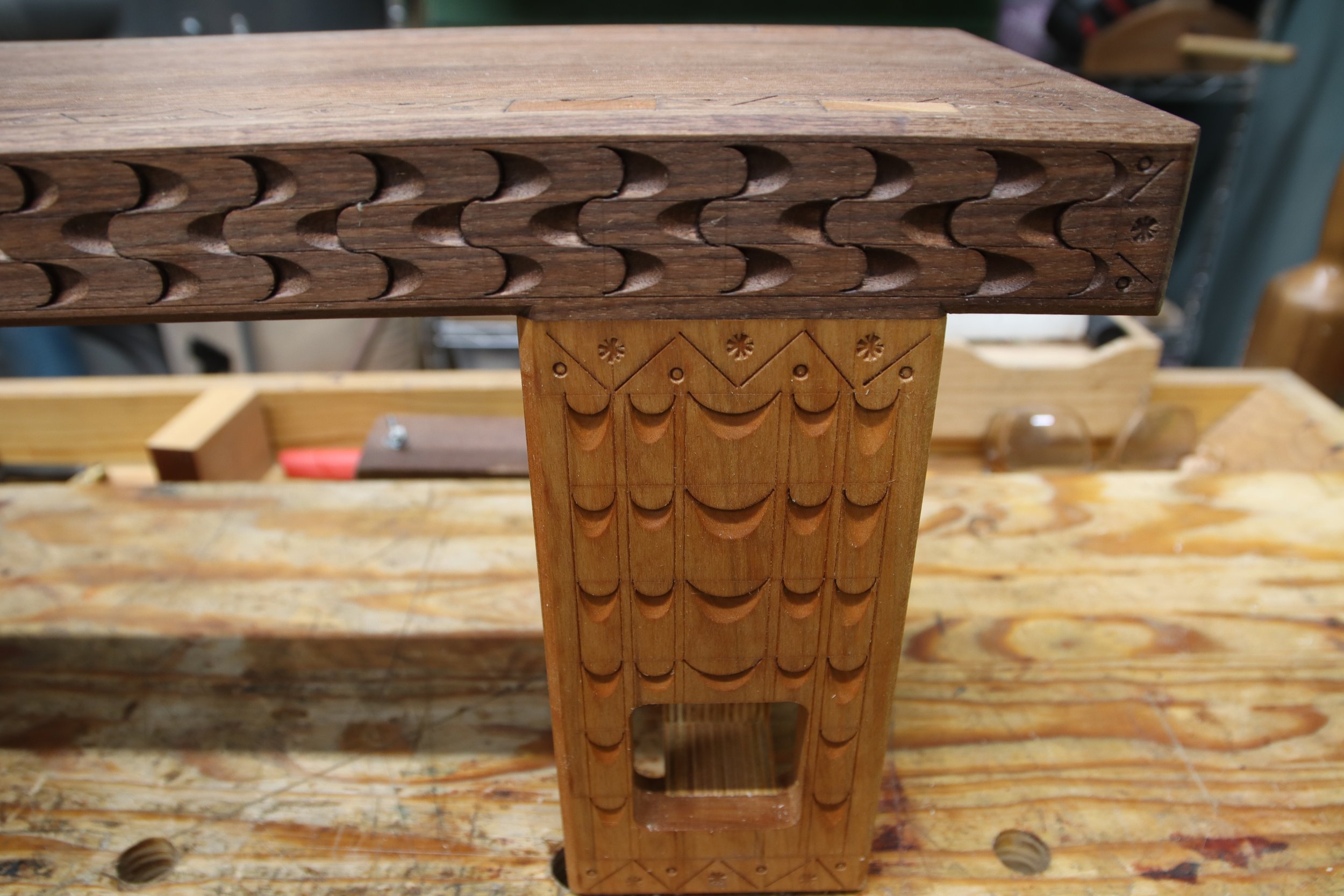 Close-up a mini-workbench with carvings