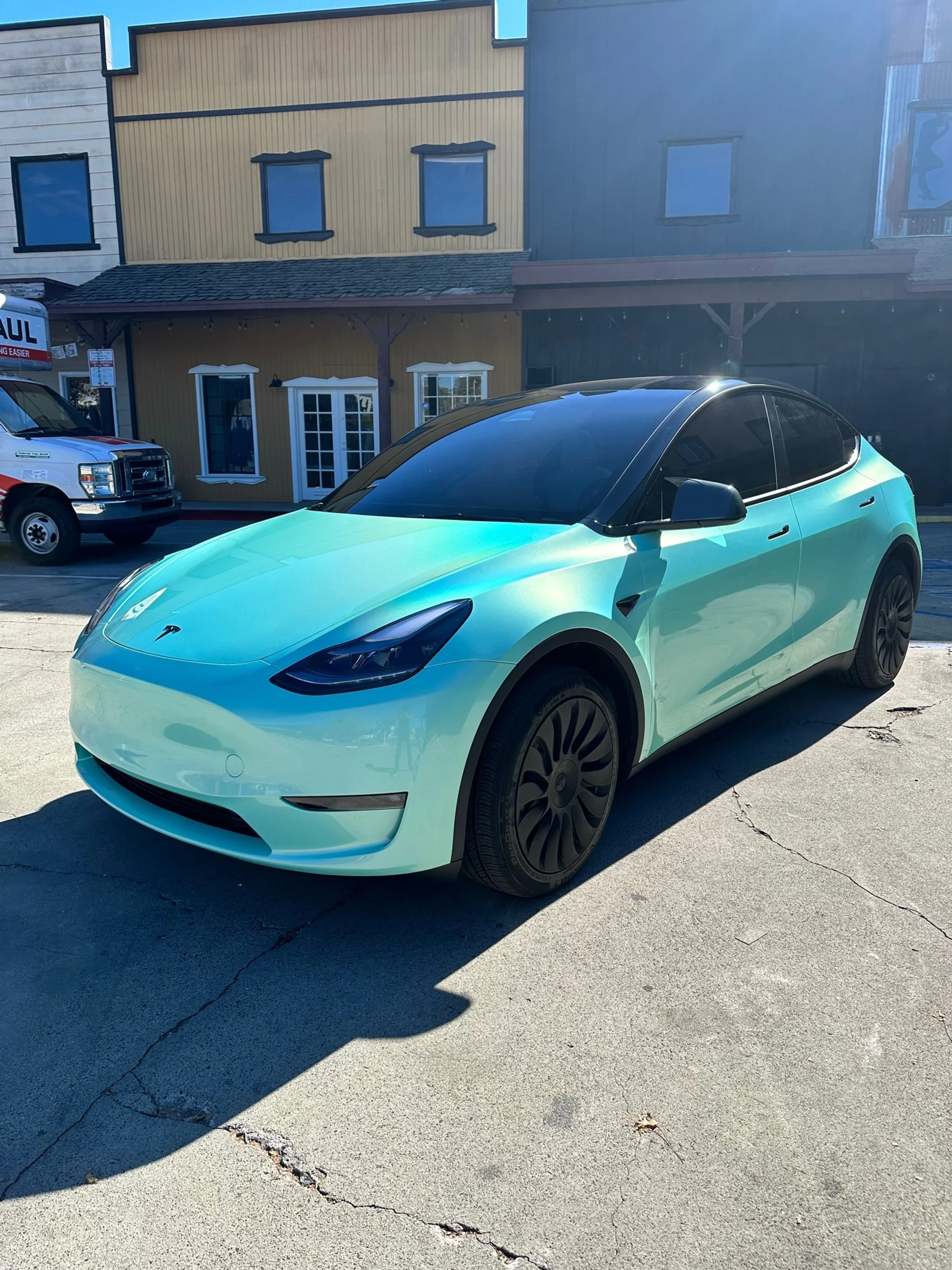 Tesla Model Y Wrapped in Aura Vinyl Tiffany Iredescent