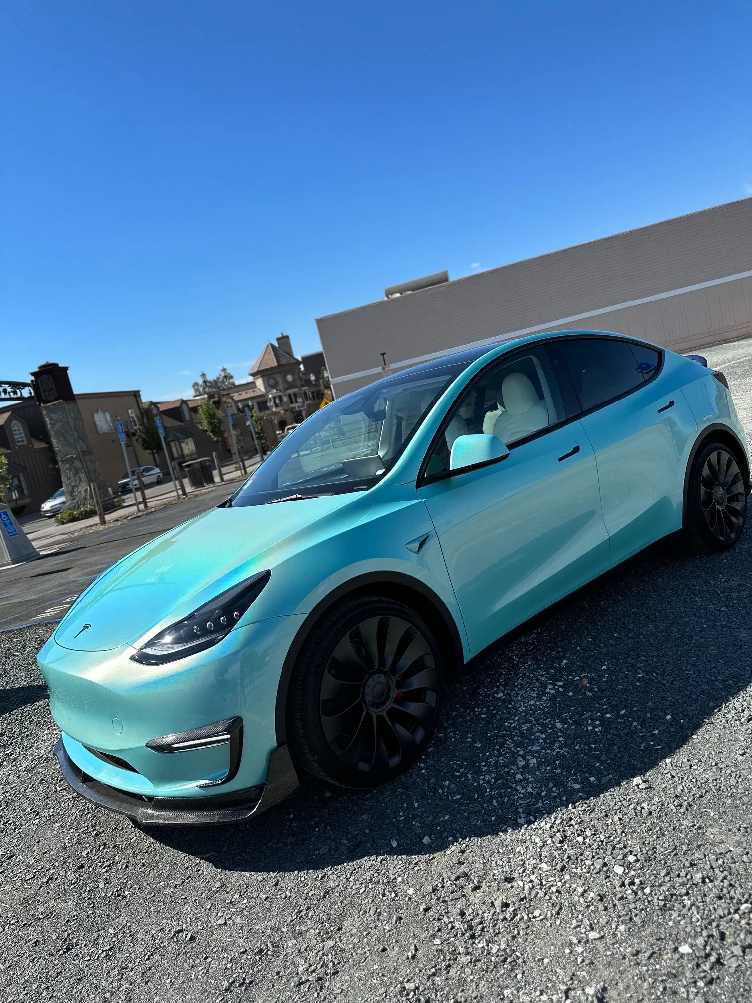 Tesa Model Y Wrapped in Aura Vinyl, Hansshow Handles, Auto Open Doors, Auto Frunk, Alpharex headlights and tail lights