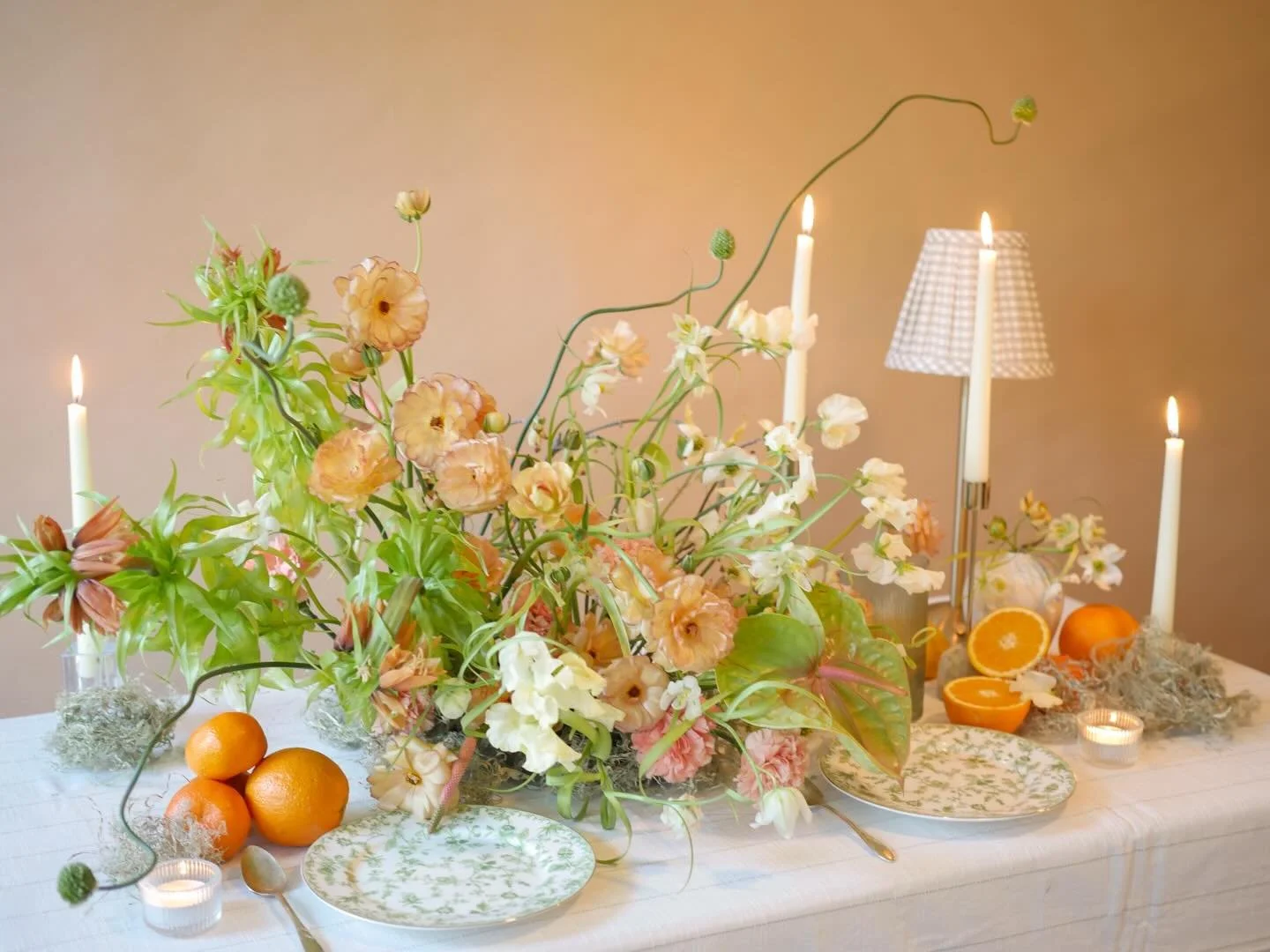 A centerpiece built around a single fritillaria that became something even funkier. A study in floral sunshine.