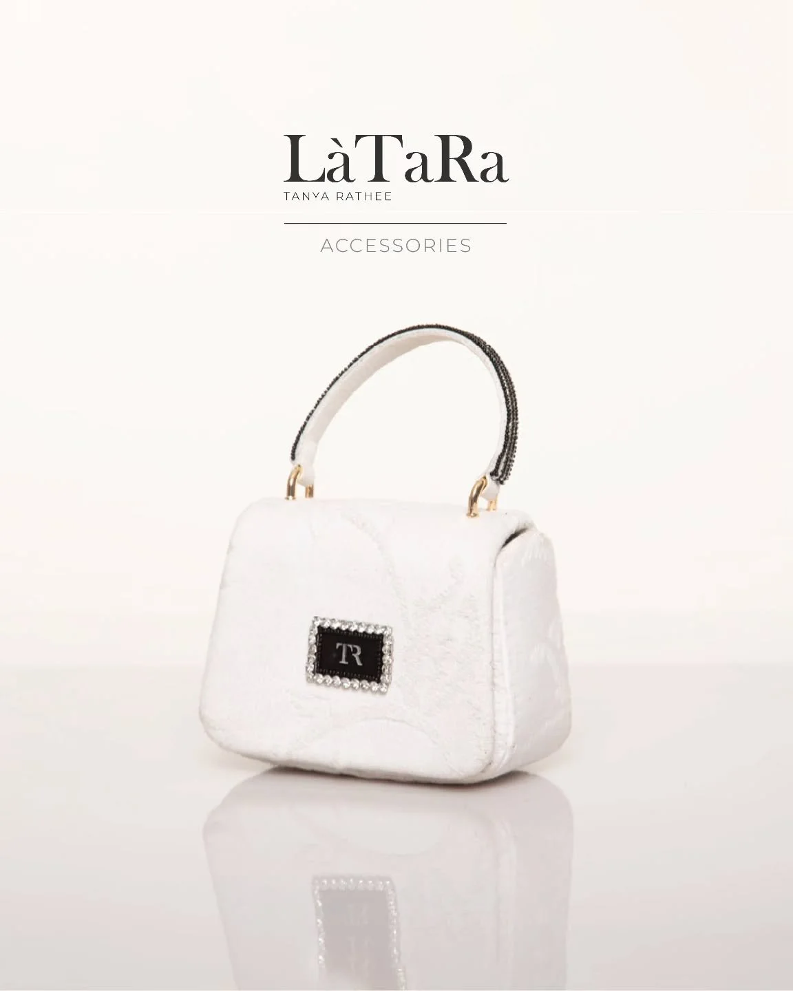 Handcrafted for little heiresses for a whimsical day out!

A minimal yet elegant jacquard purse with L&agrave;TaRa monogram is designed to complement your little one&rsquo;s look.

[LaTara Accessories, Aura By Latara, Luxury Mini Bag, Kids Fashion, J