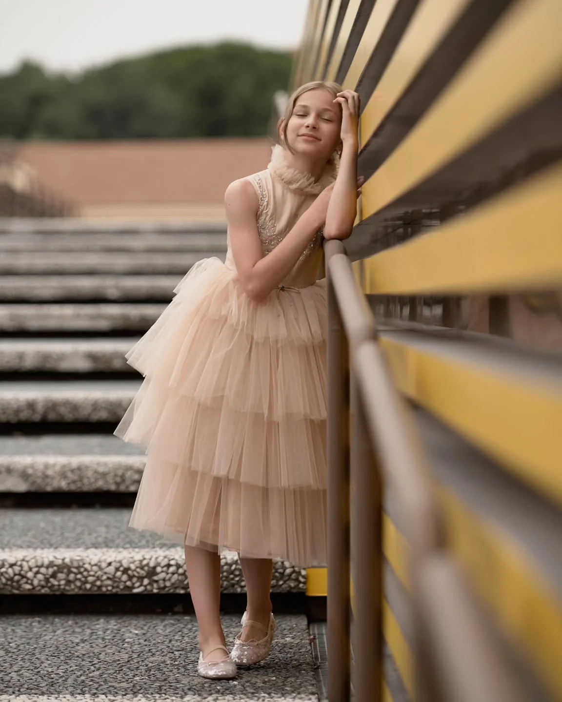 In layers of dreams, she softly sways,
A whisper of elegance in golden haze.
Steps that dance, eyes that gleam,
She&rsquo;s stitched from stardust and a little dream.

[LaTara Kid, Elegant Dress, Worldwide Shipping, Luxury kidswear, Ethereal charm, L