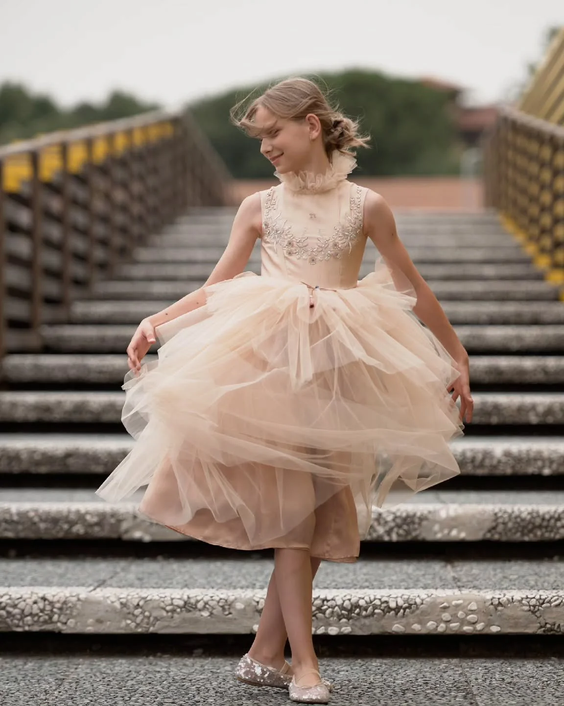Unfolding elegance with every intricate detail and layer

A delicate beige tulle dress designed in layers with intricate hand embroidery of pearls and fine threads that adds a timeless charm to this ethereal piece.

Now available to shop in India and