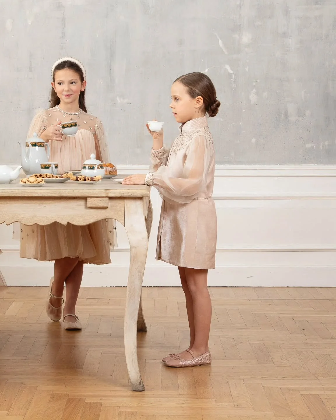 Where every silhouette whispers elegance.

Pastel hues, delicate details, and couture craftsmanship as a dreamy chapter of childhood luxury begins with Tales Over Tea.

[LaTara, Kidswear, Luxury Kidswear, LaTara Kids, TalesOverTea, Kids Collection, C