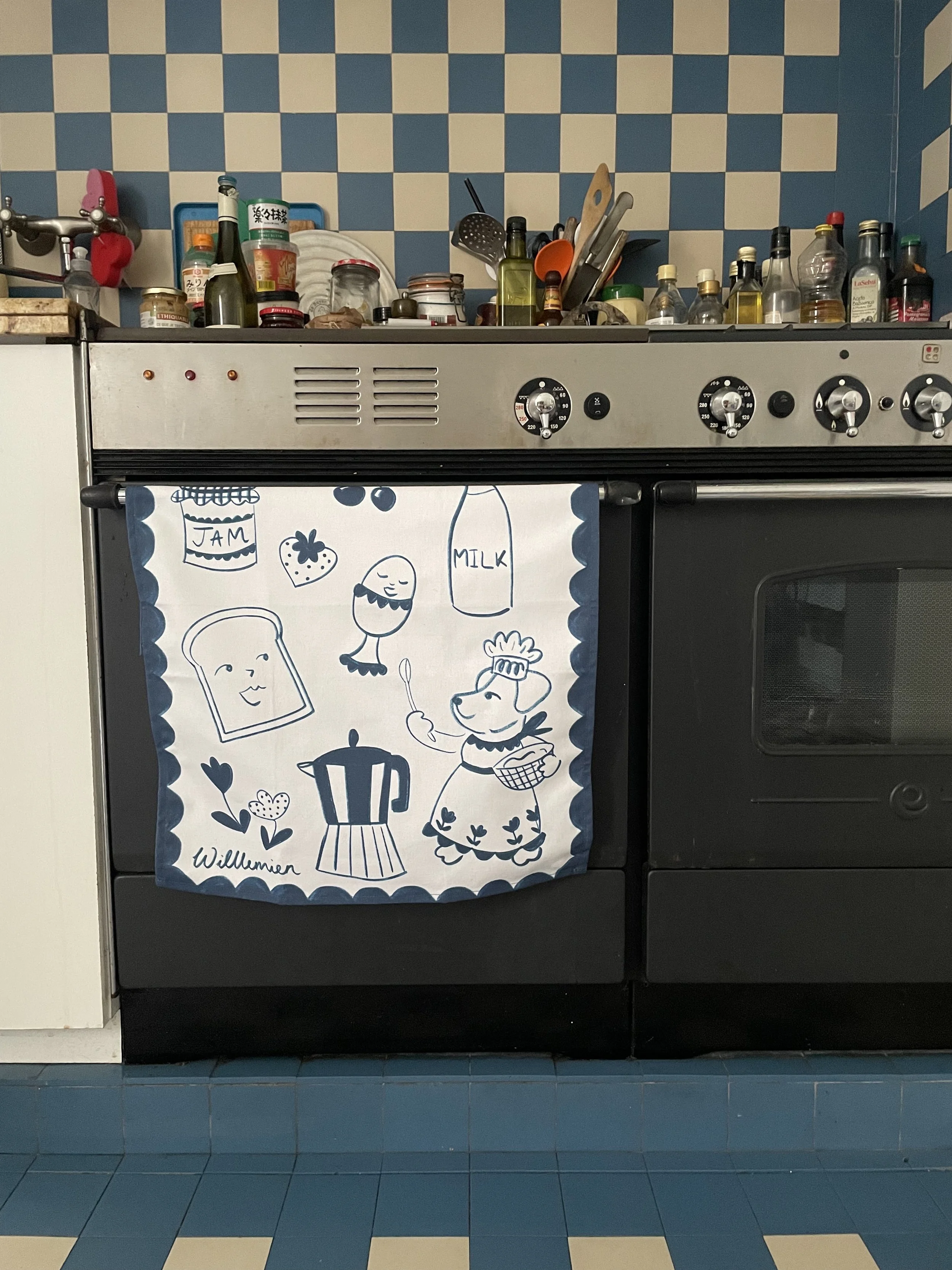 sweet pup tea towel in kitchen.jpg