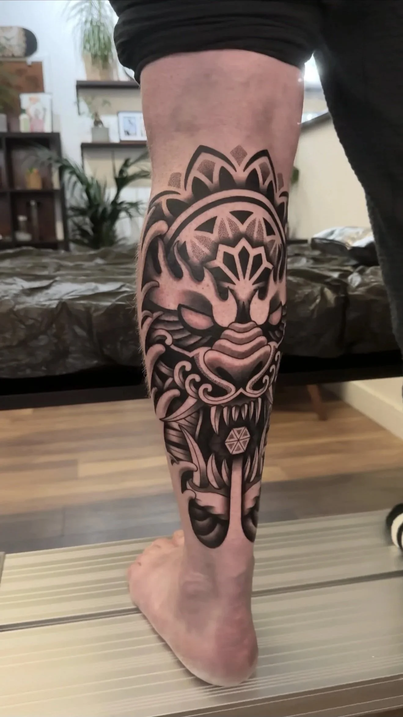 geometric-fu-dog-calf-tattoo-devon-uk-custom-tattoo-ideas