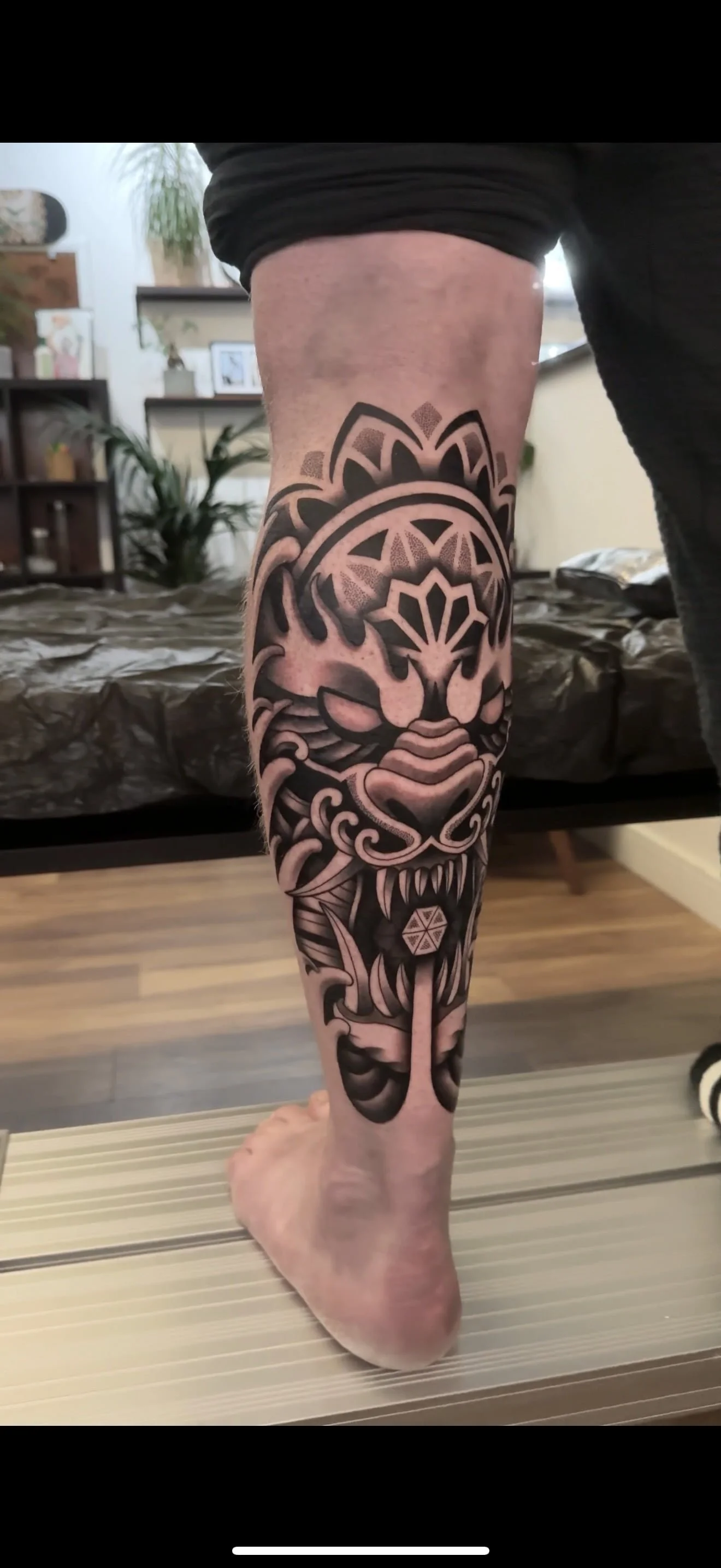 geometric-fu-dog-calf-tattoo-devon-uk-custom-tattoo-ideas.jpg