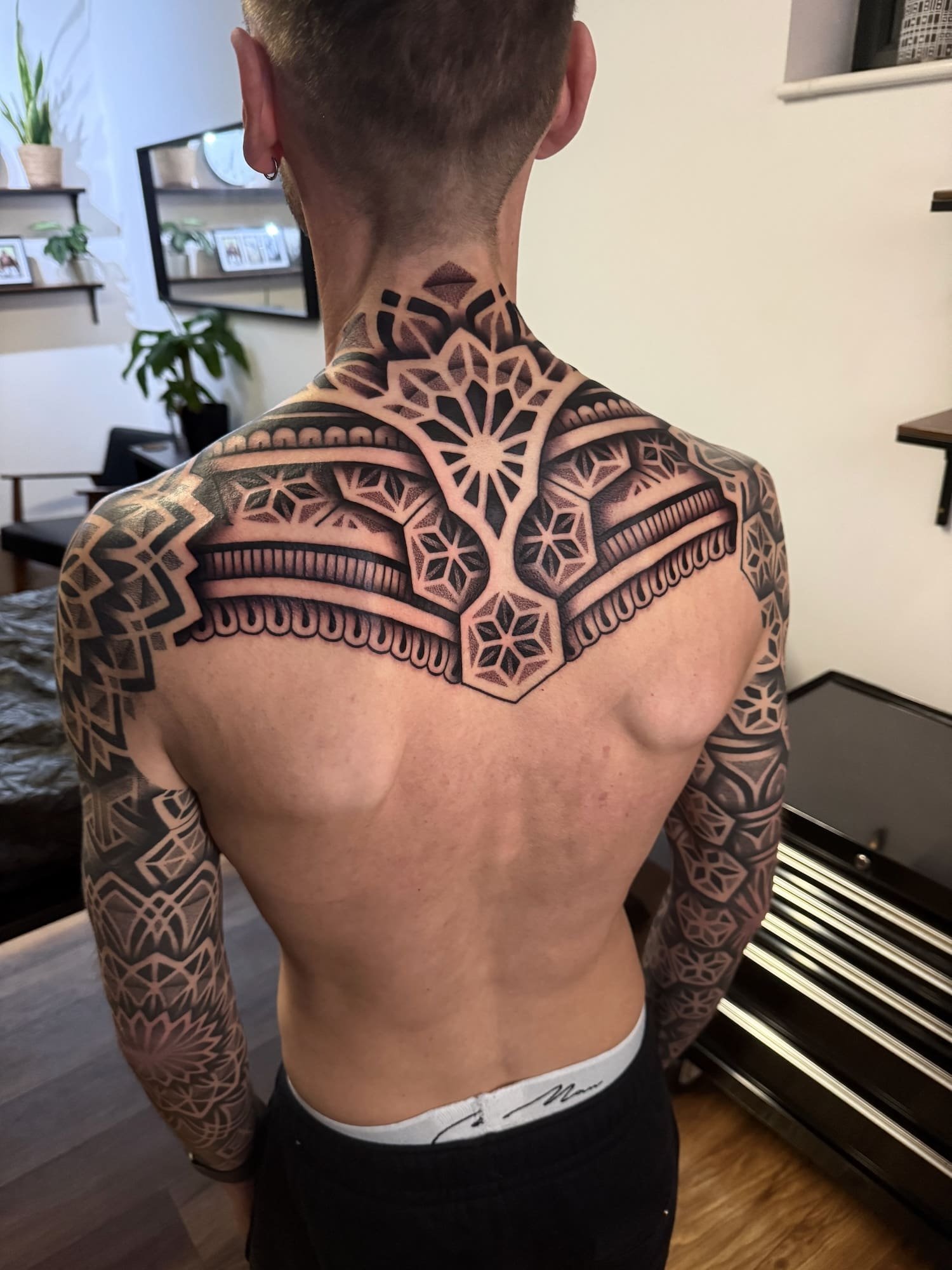 ornamental-geometric-half-back-tattoo-devon-uk-custom-tattoo-ideas.jpg