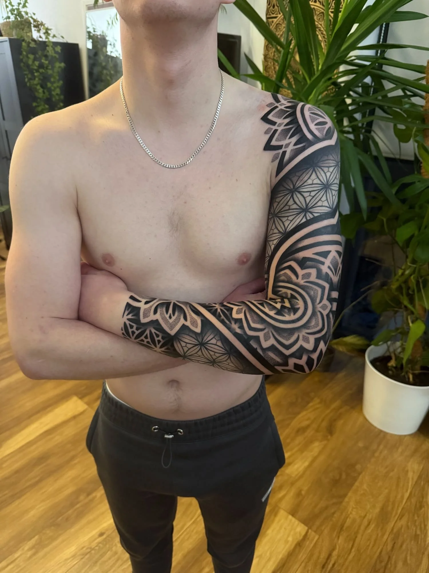 folded-arms-geometric-full-sleeve-devon-uk-custom-tattoo-ideas.jpg
